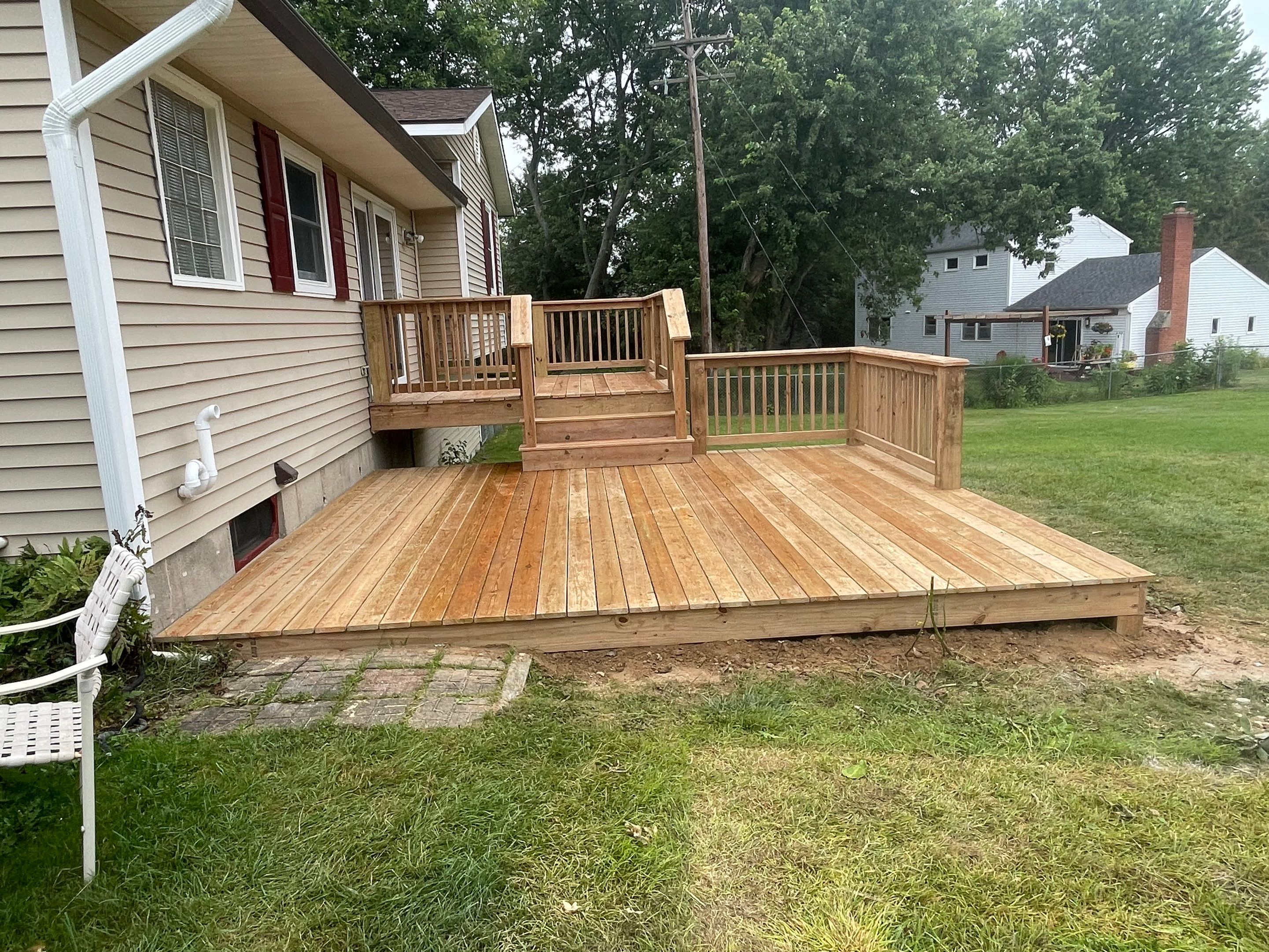 Deck Installation using Treated Lumber by Avalon Roofing and Exteriors