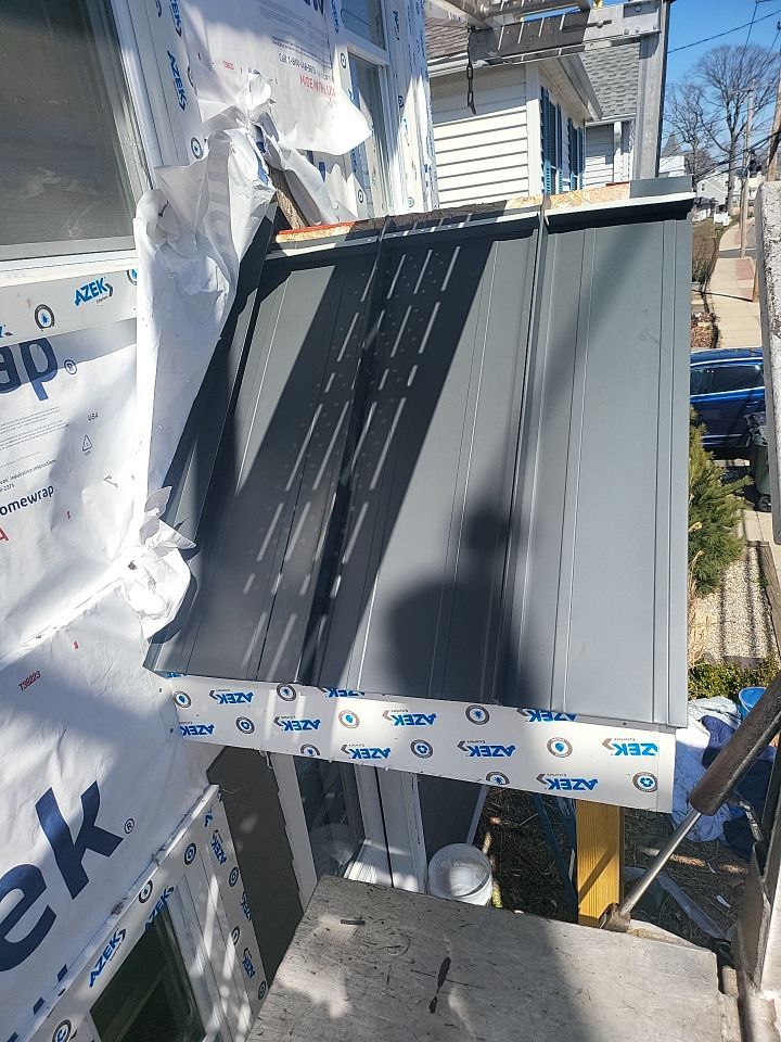 Siding Installation using Hardie Plank Aged Pewter by A Plus Exterior