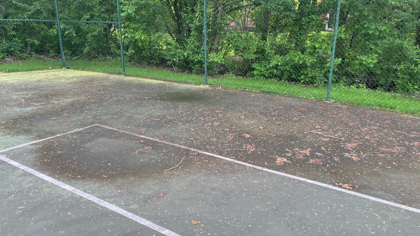 Tennis Court using Algaecide, soft wash soap by Northern Power Washing LLC.