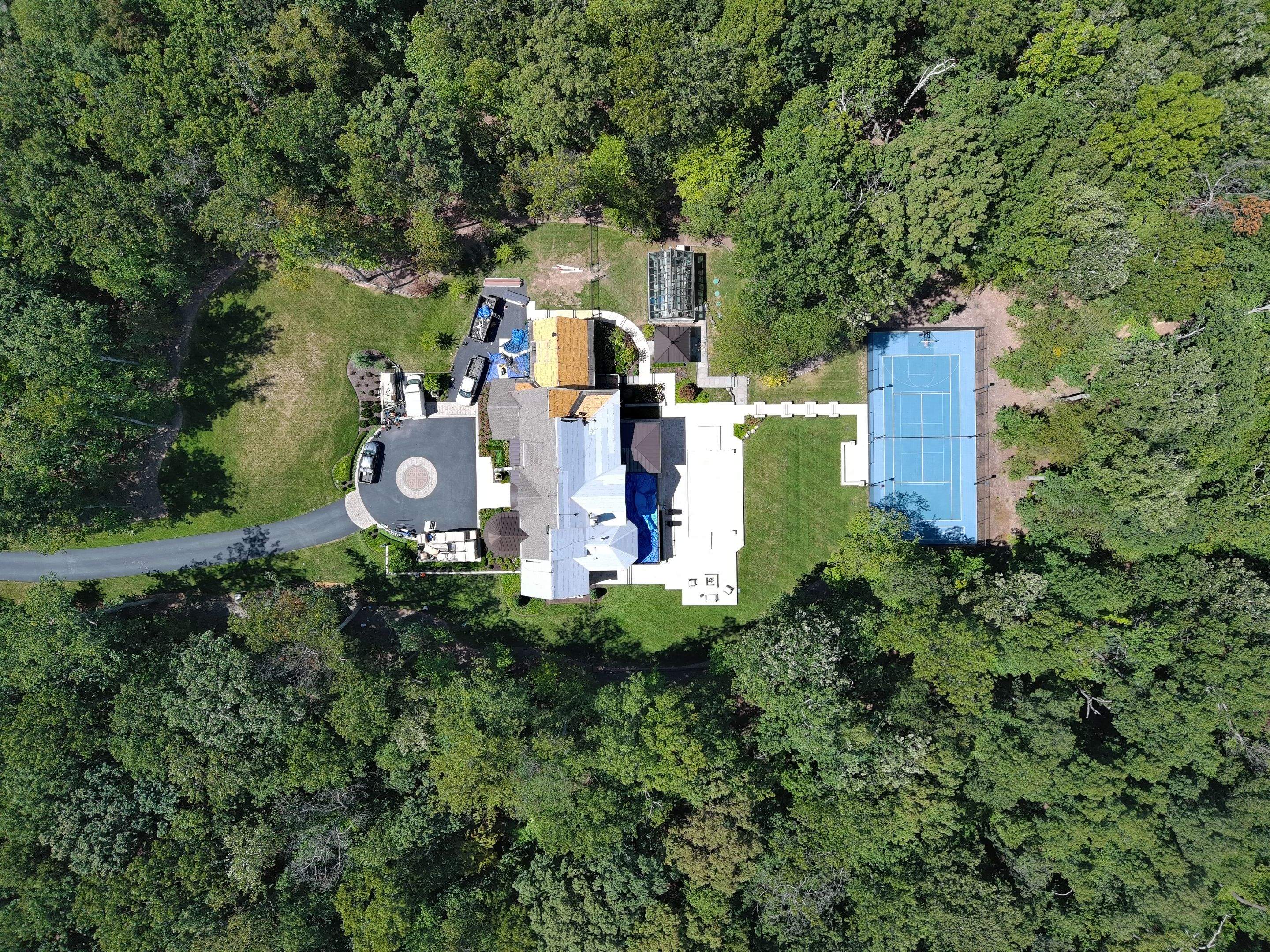 STUNNING Tesla Solar Roof in Virgina by American Home Contractors