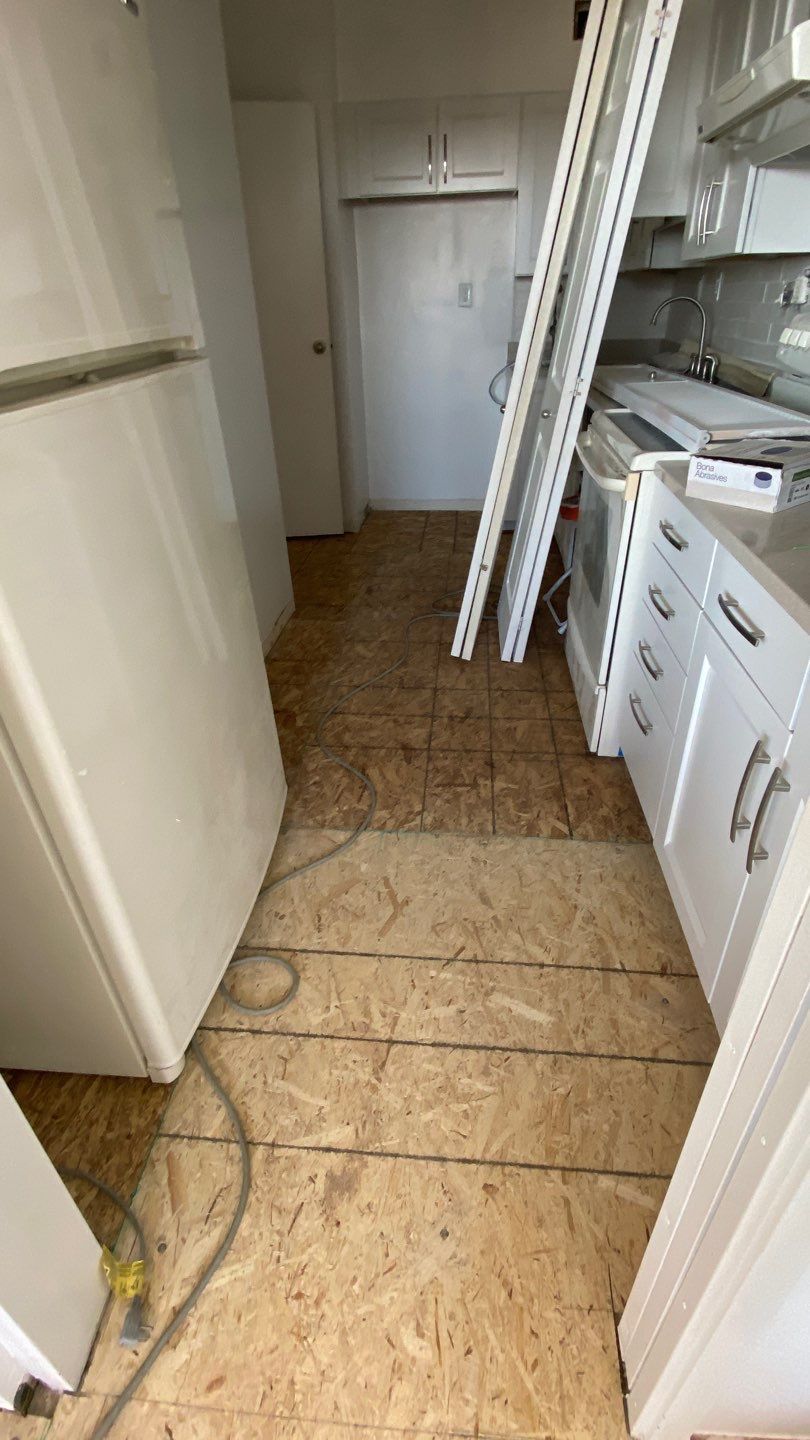Apartament renovation  using Harwood floor  by Jesus Master Handyman LLC 