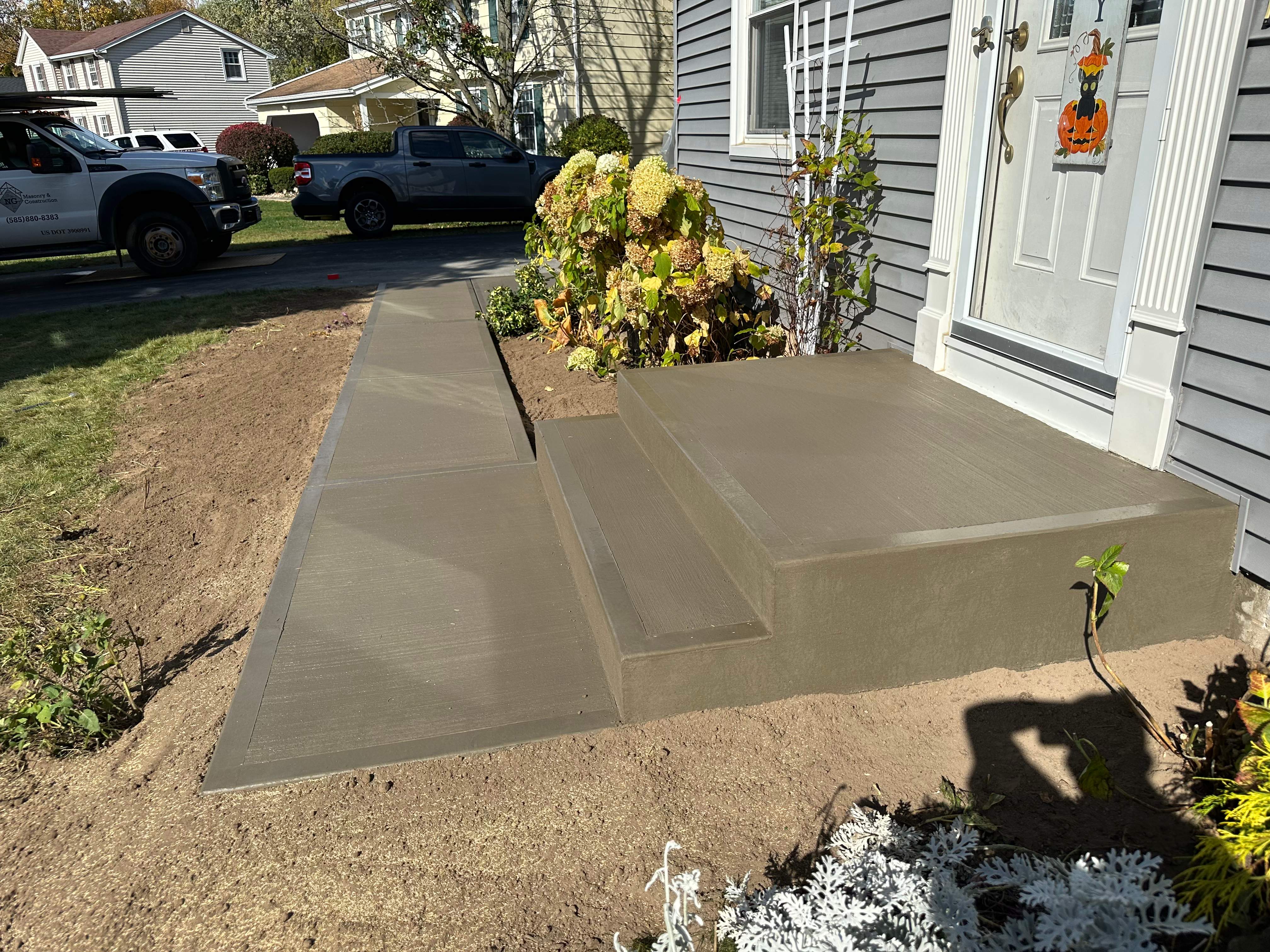 Broom Finish Walkway and Porch  by NG Masonry & Construction LLC