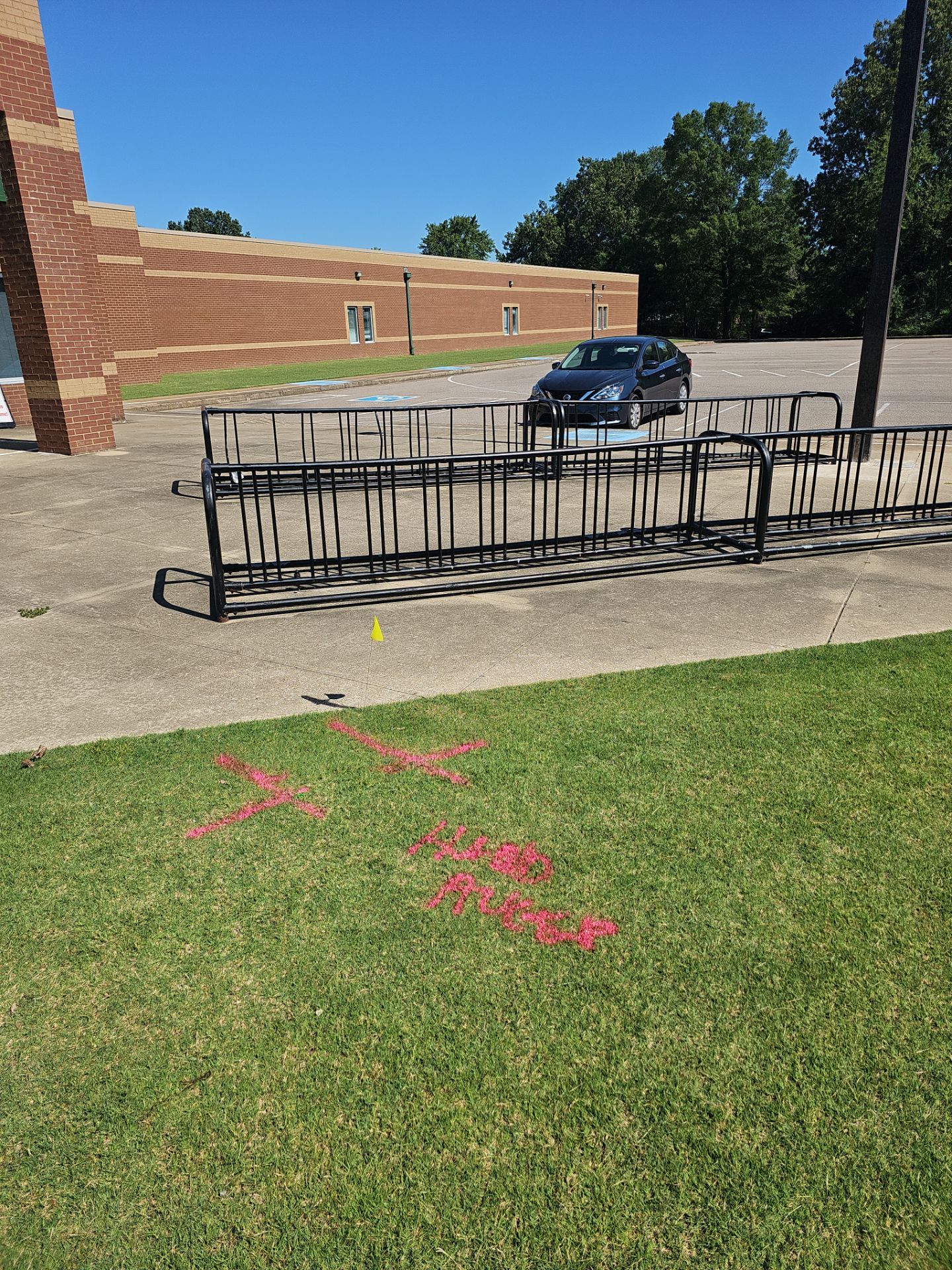 Utility Locating at a school for fence install by Alsip Locating Service, LLC