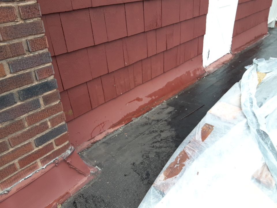 Residential Roof Replacement using Patio Roof by Absolute Roofing and Construction