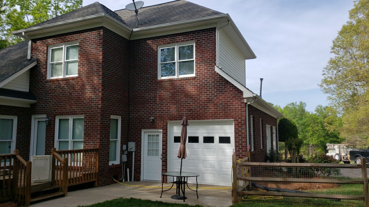 House Wash using cleaner by Power Wash Masters LLC