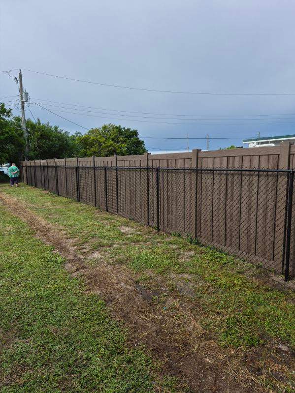 Black Chain Link Fence Installation for Residential Backyard in Port Charlotte by True Fence LLC