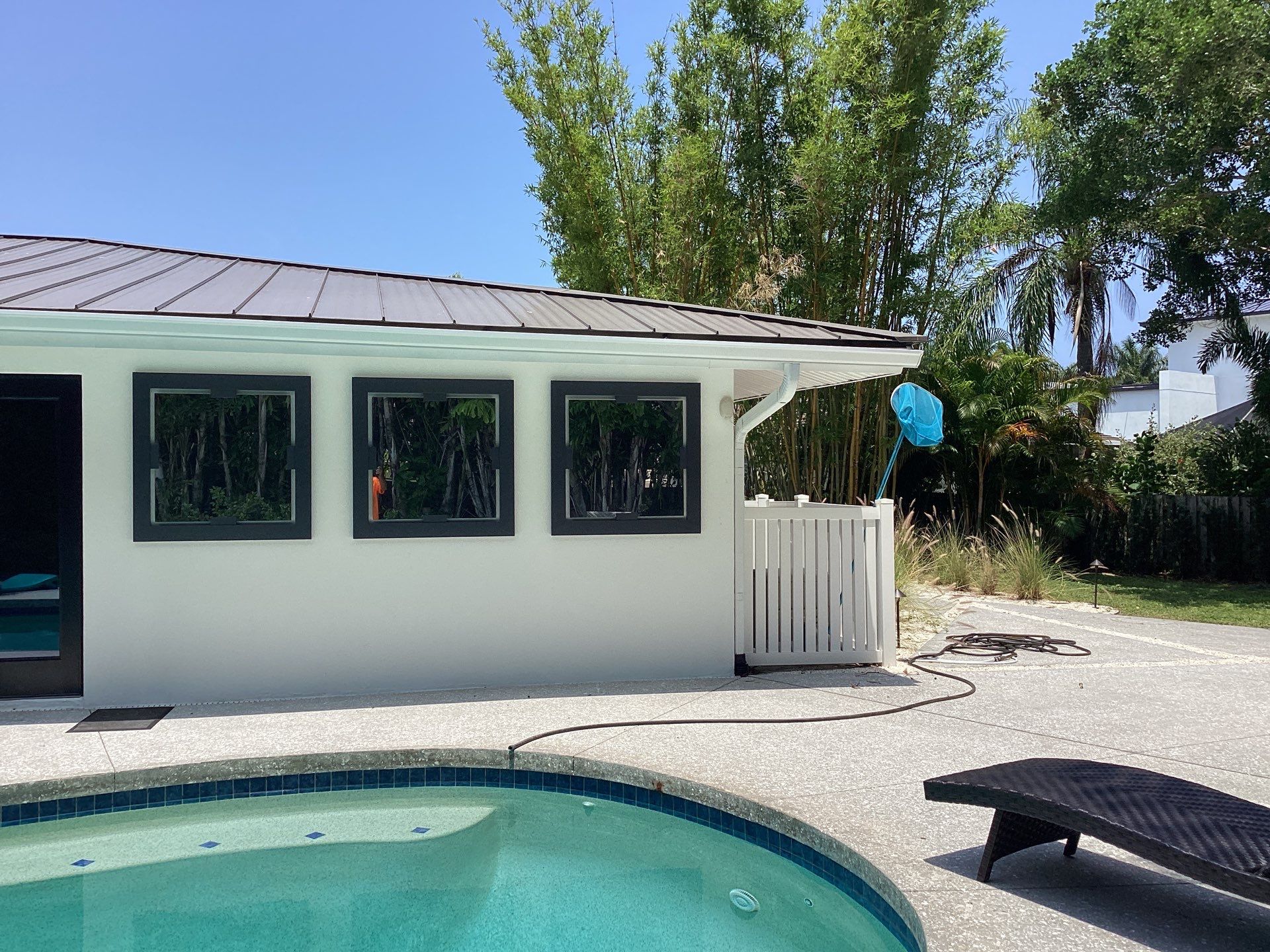 White Seamless Gutters and Downspouts in Sarasota FL by Gutter Professors