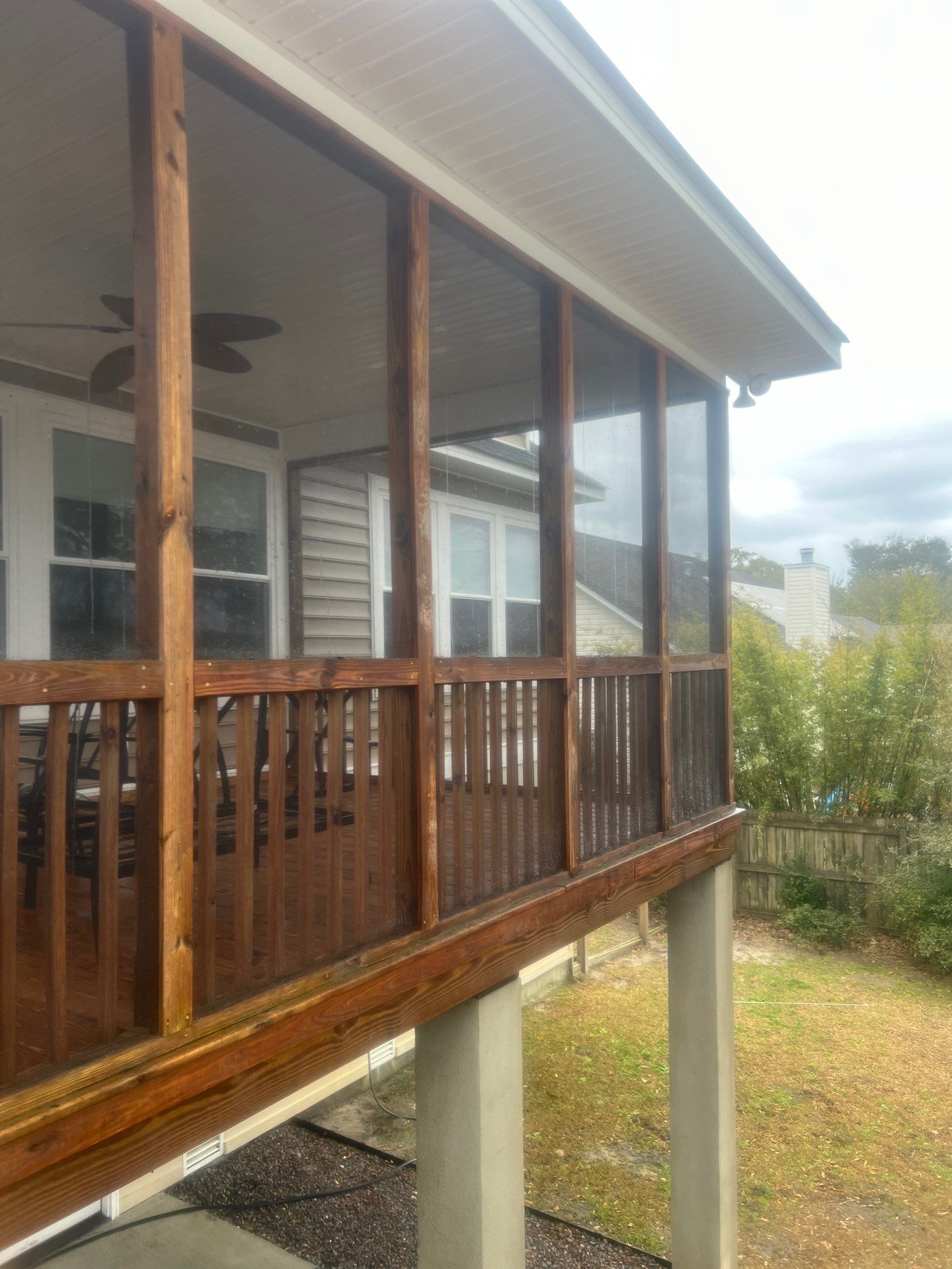 Weathered Deck and Screened Porch using Wood Sealant by DuraSeal