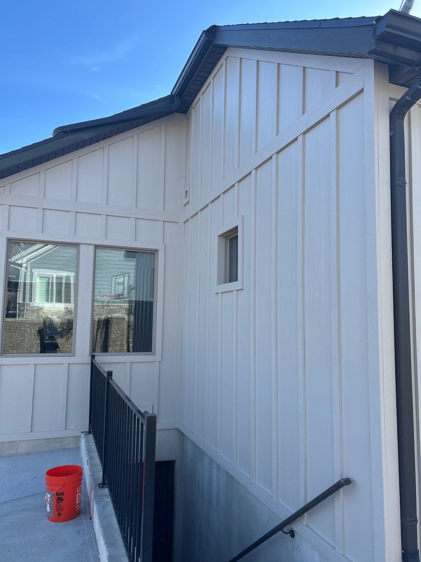 South Jordan | Massive Board & Batten Upgrade | Cobble Stone & Dark Bronze by Ideal Siding Utah