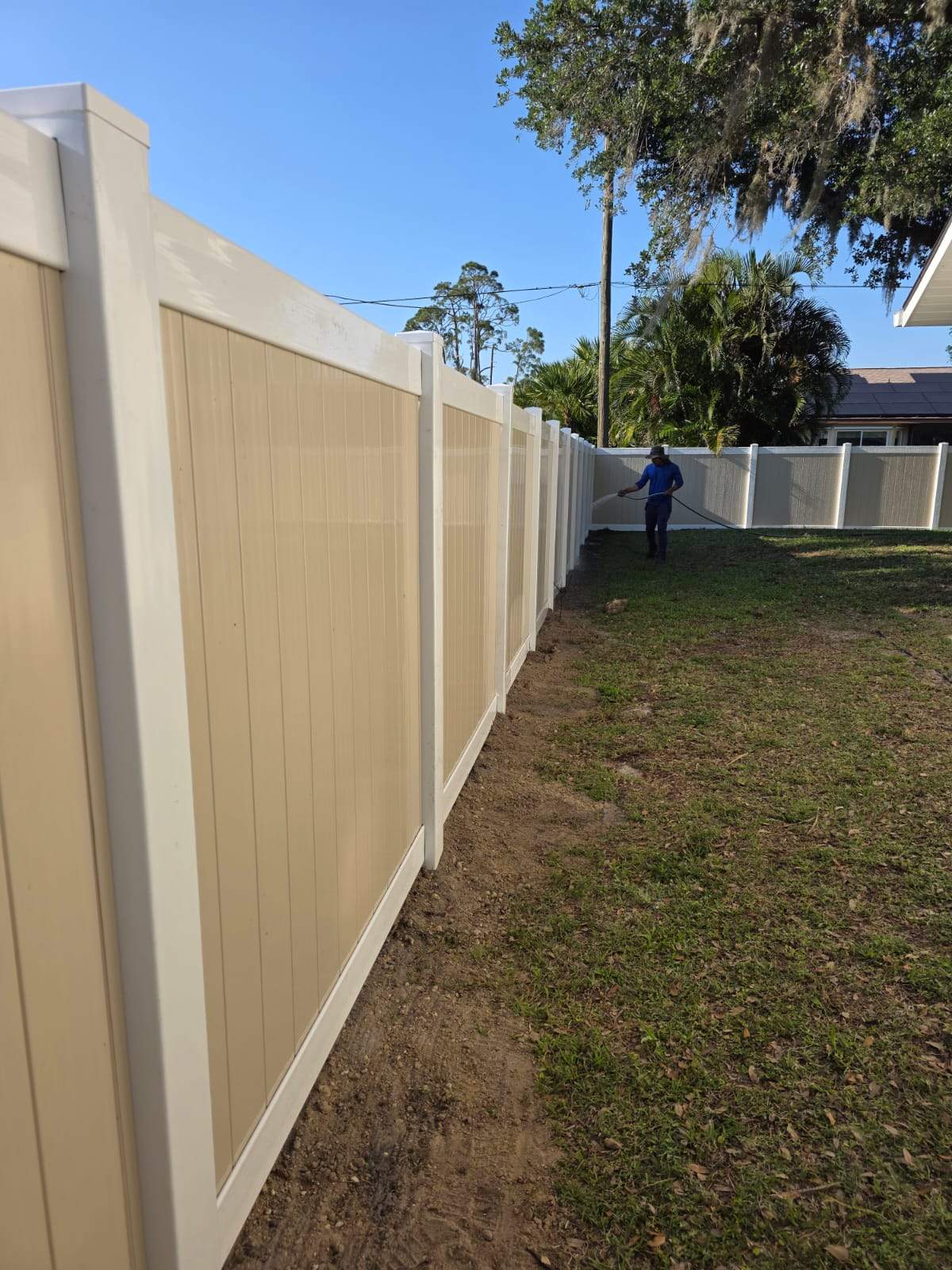 Two-Tone Vinyl Privacy Fence Installation in Port Charlotte by True Fence LLC