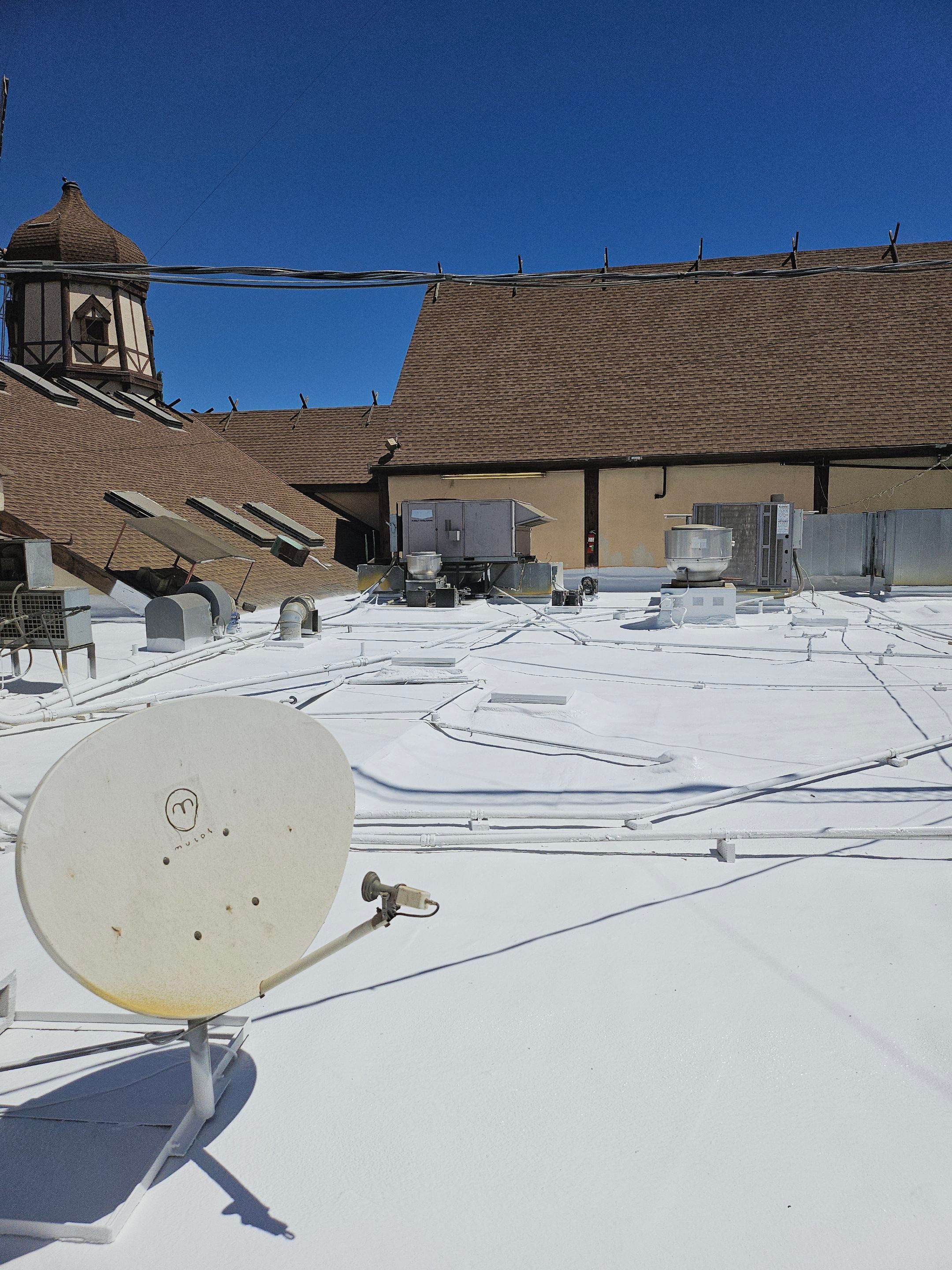 Spray foam and coatings using General Coatings acrylic coatings and spray foam by Straight Edge Roofing Inc