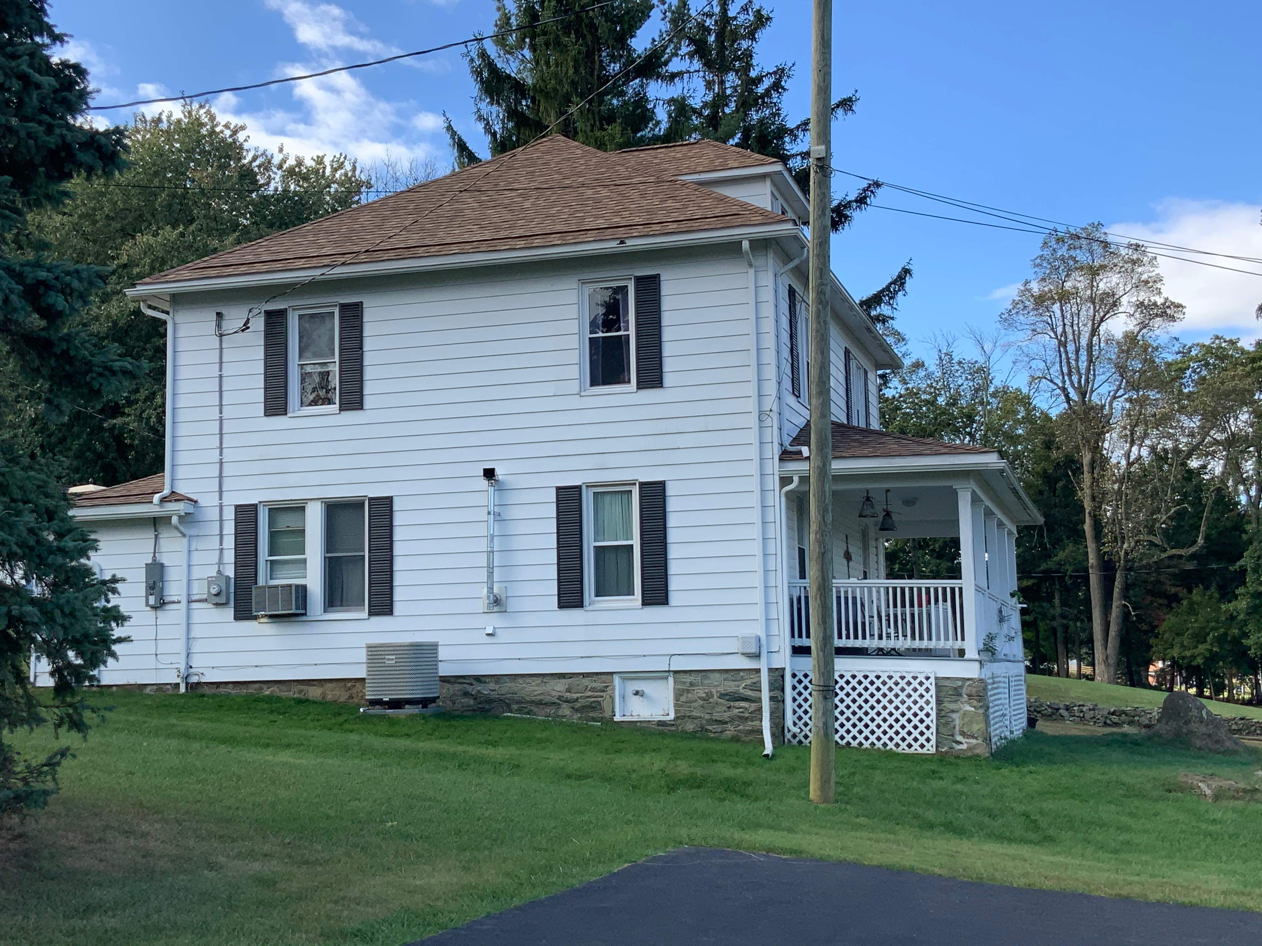Residential Roofing Installation using Max Def Resawn Shake by Alpha Design Services