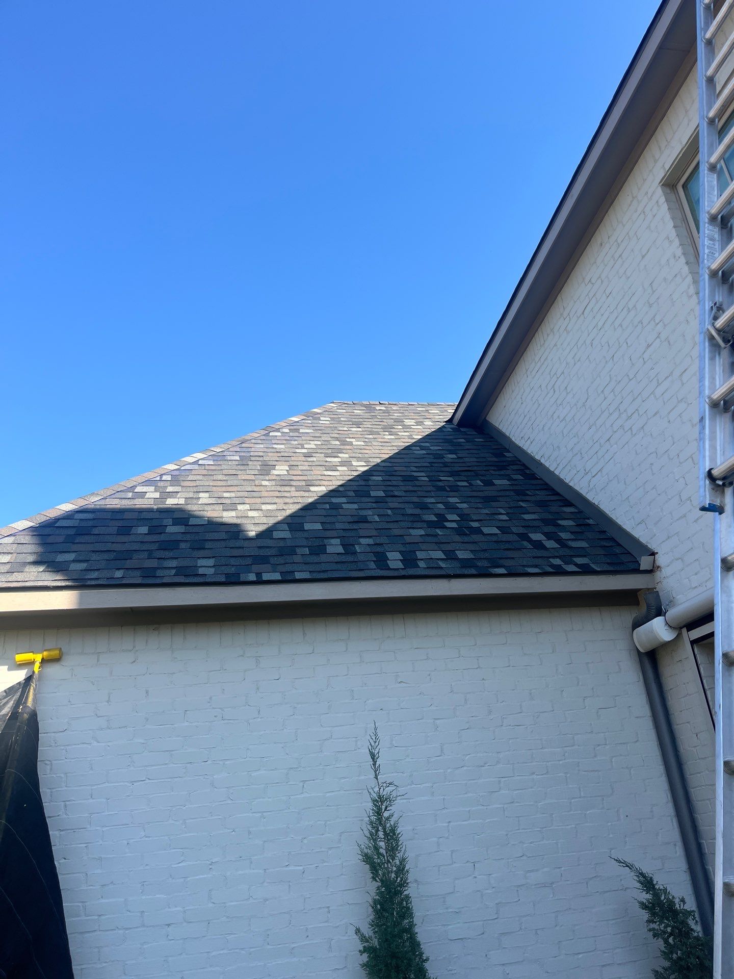 TAMKO Thunderstorm Grey-White Brick  by Tejas Roofworks + Restoration