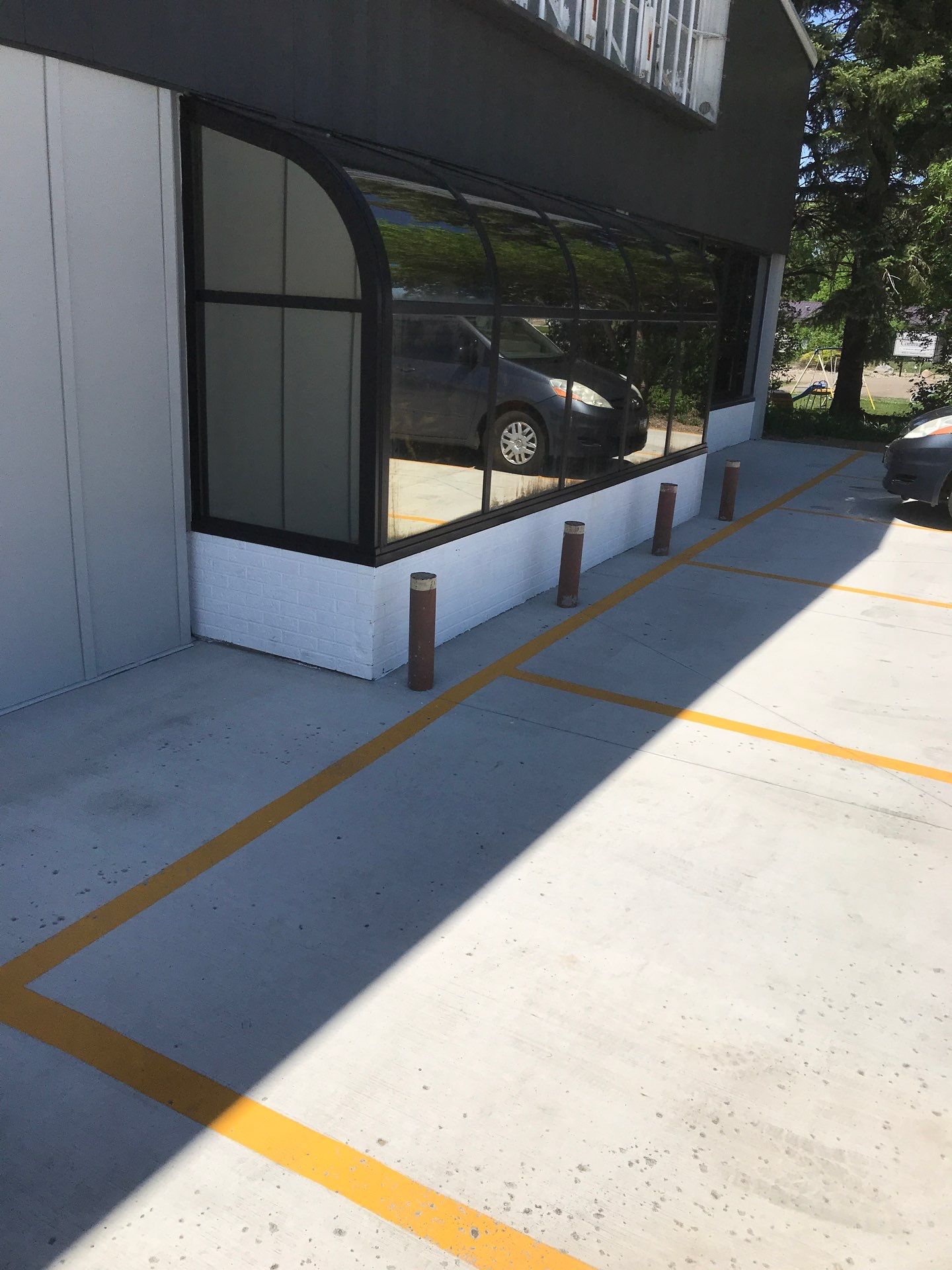 Commercial Shop Renovation and Concrete Parking Installation in Brookings by Select Painting, Coatings & Garage Cabinets