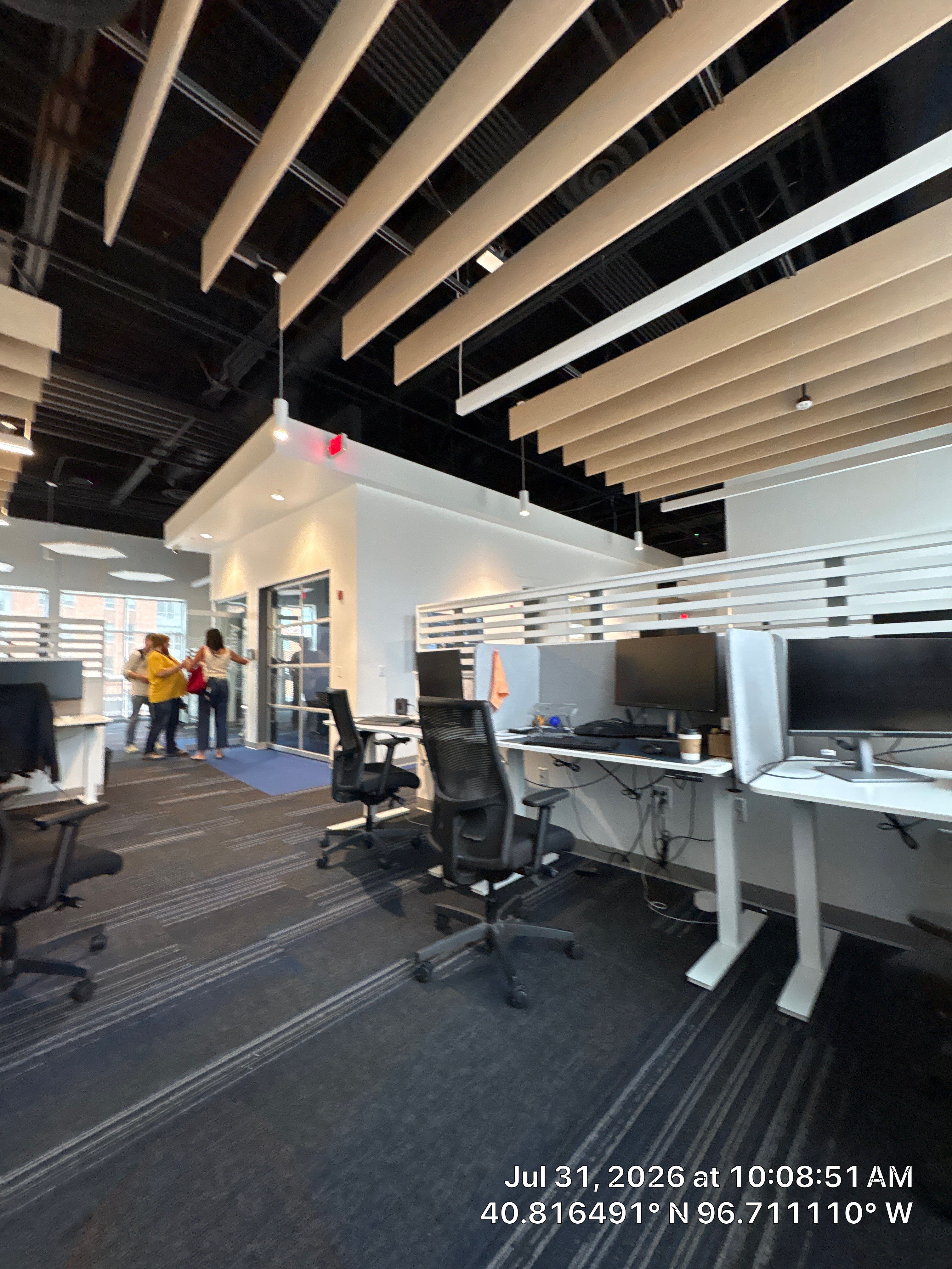 Modern Commercial Office Fit-Out with Acoustic Baffles in Lincoln by CompanyCam Sales Demo
