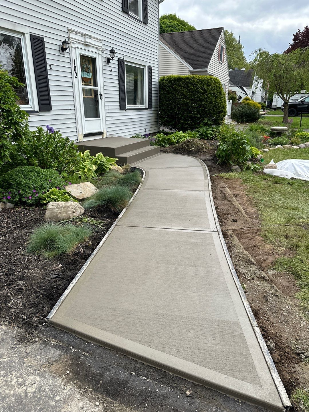 Broom Finish Walkway  by NG Masonry & Construction LLC