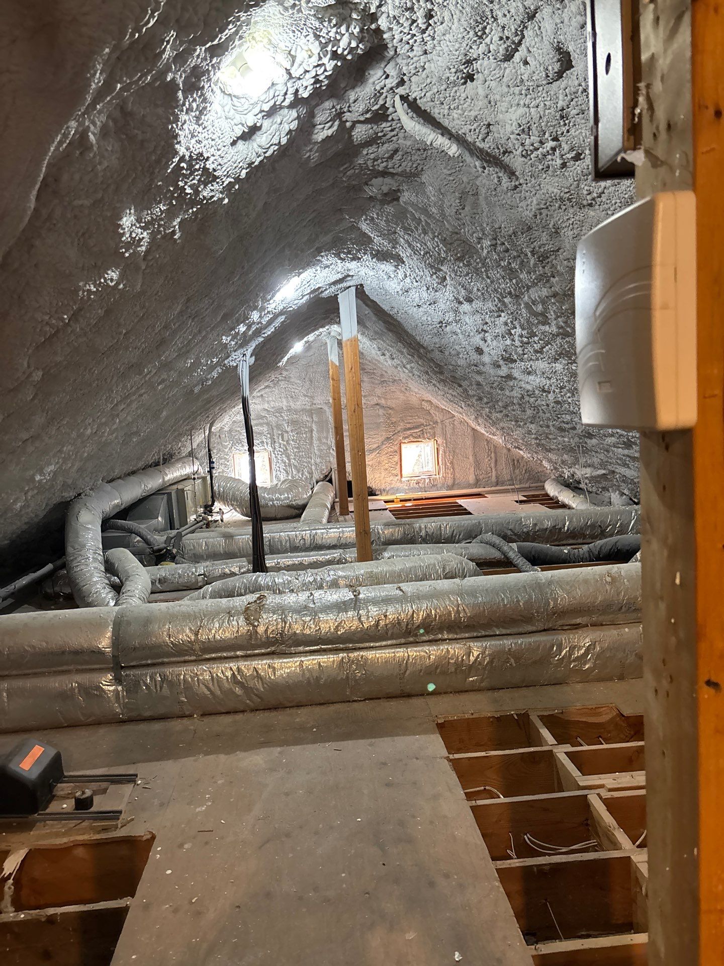 Attic Insulation using open cell spray foam by NYS Foam & Energy