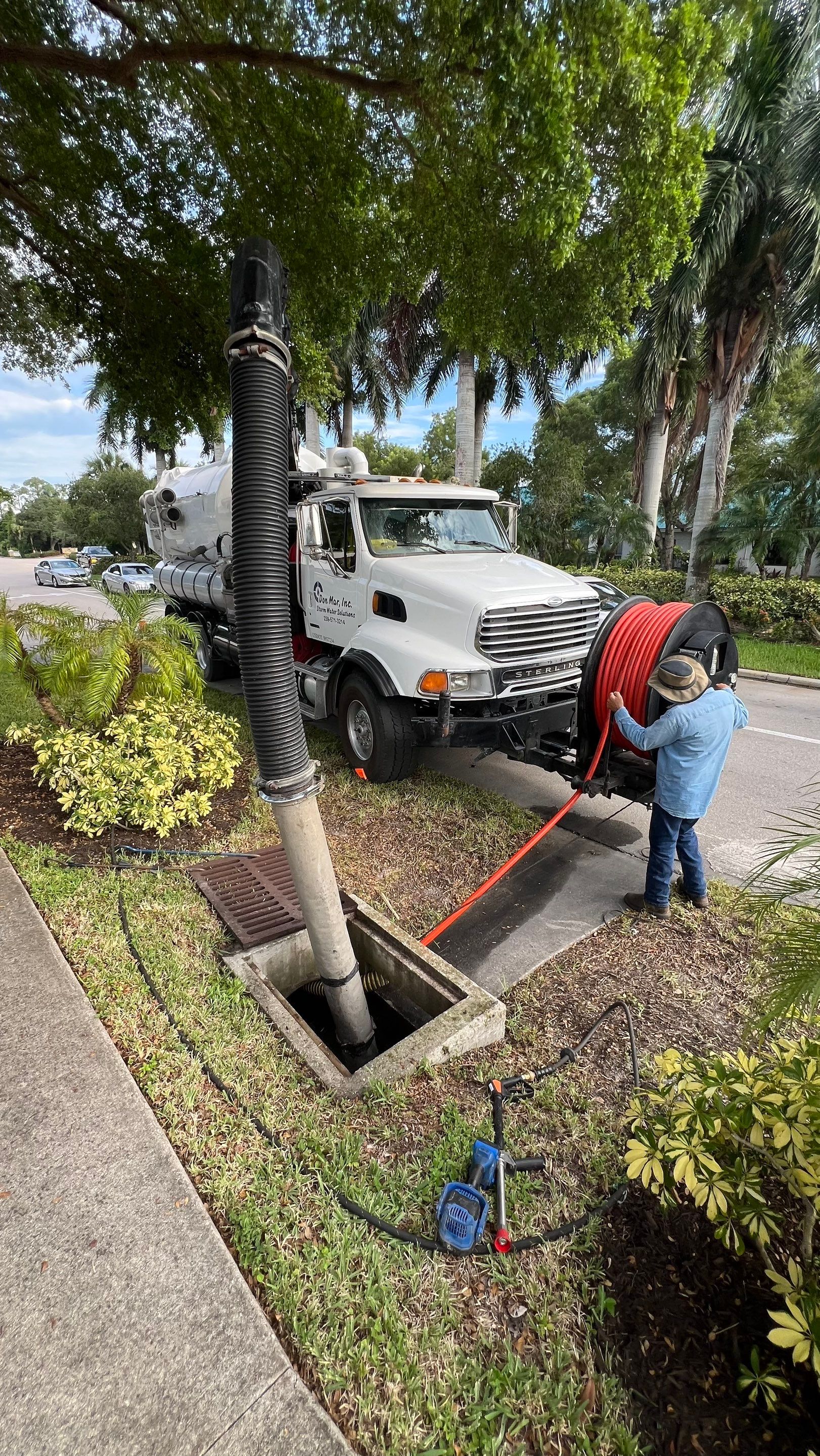 Naples Community Entry Road Stormwater System Cleaning by APS Power & Water