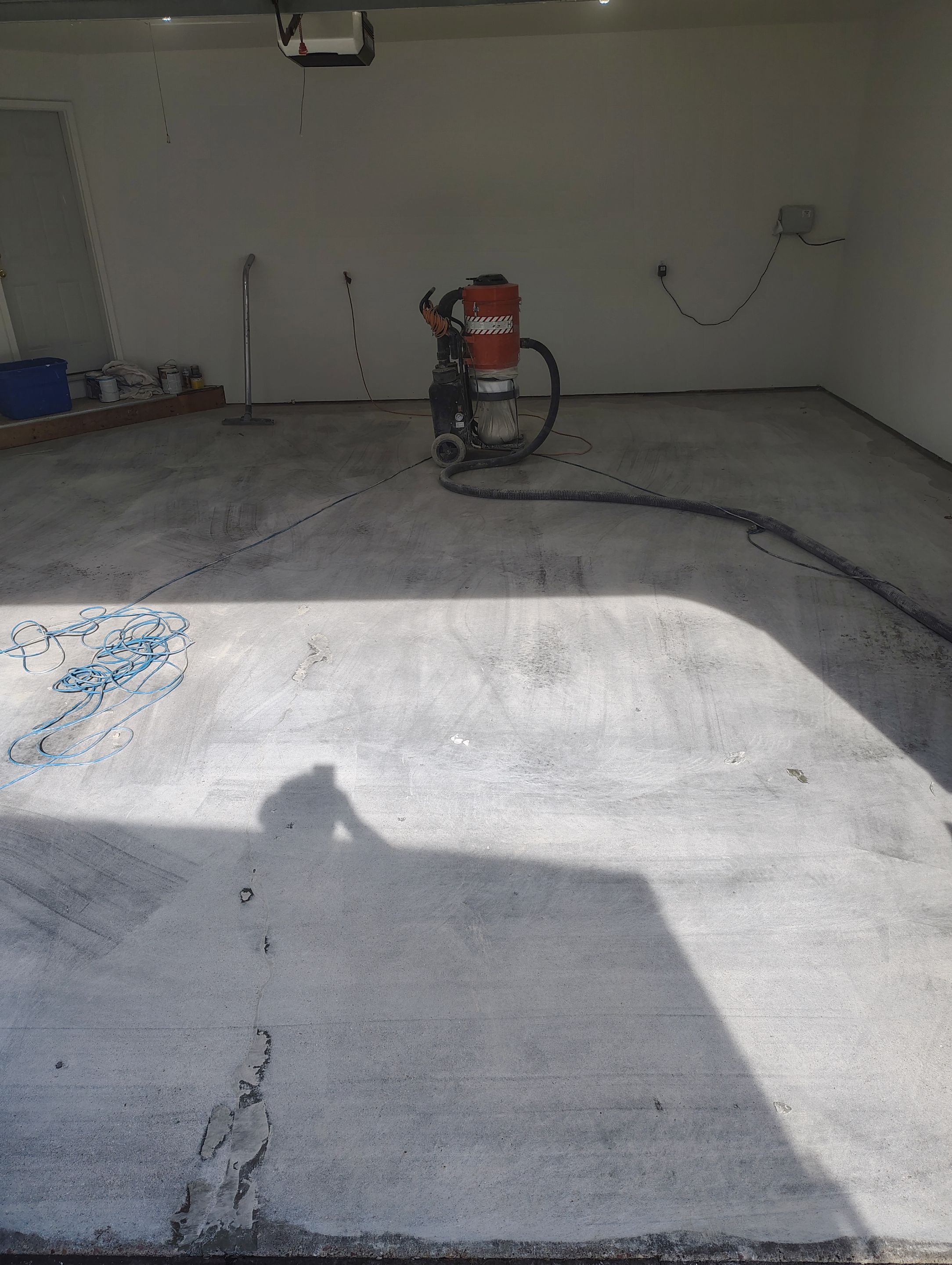 Sioux Falls Garage Floor Coating with Speckled Flake Finish by Select Painting, Coatings & Garage Cabinets