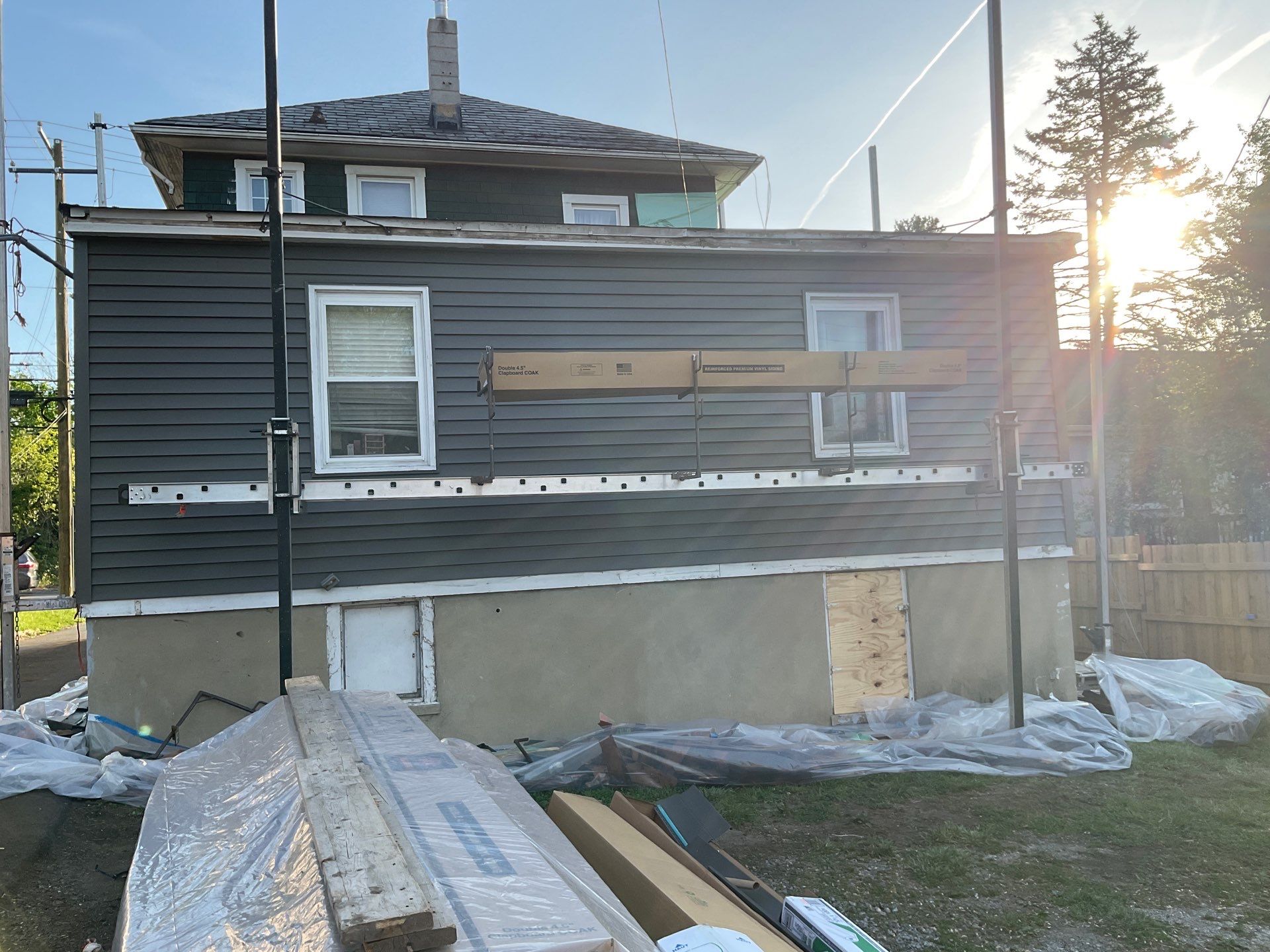 New siding & New Gutters by Alpha Design Services