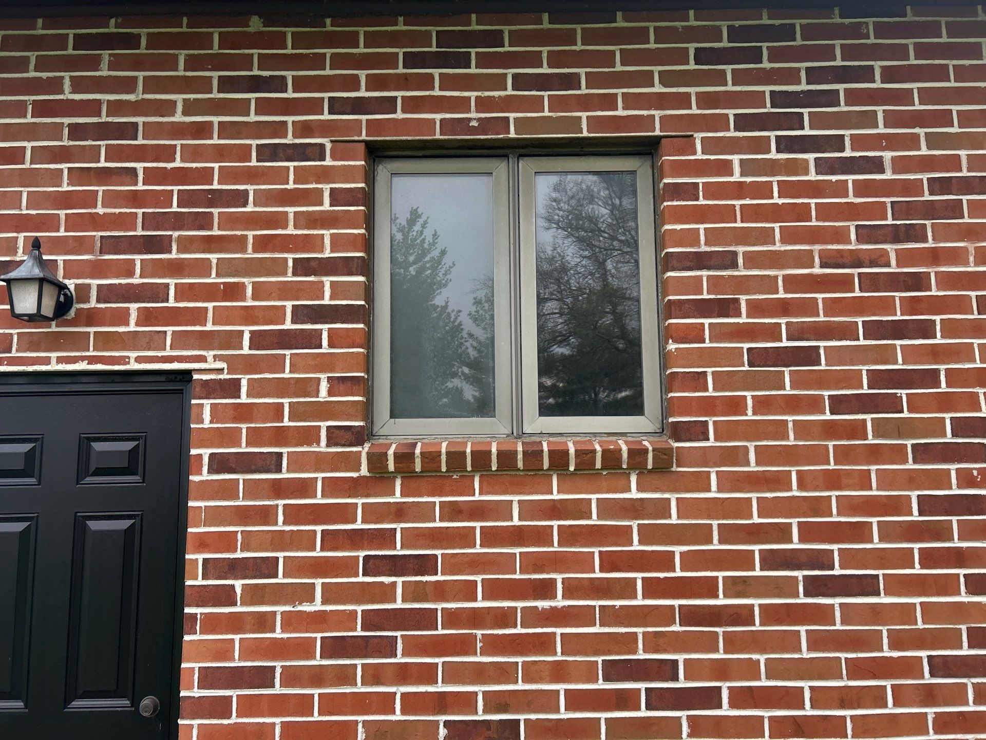 Window replacement using Pella Lifestyle wood/Aluminum window by United Windows and Siding LLC