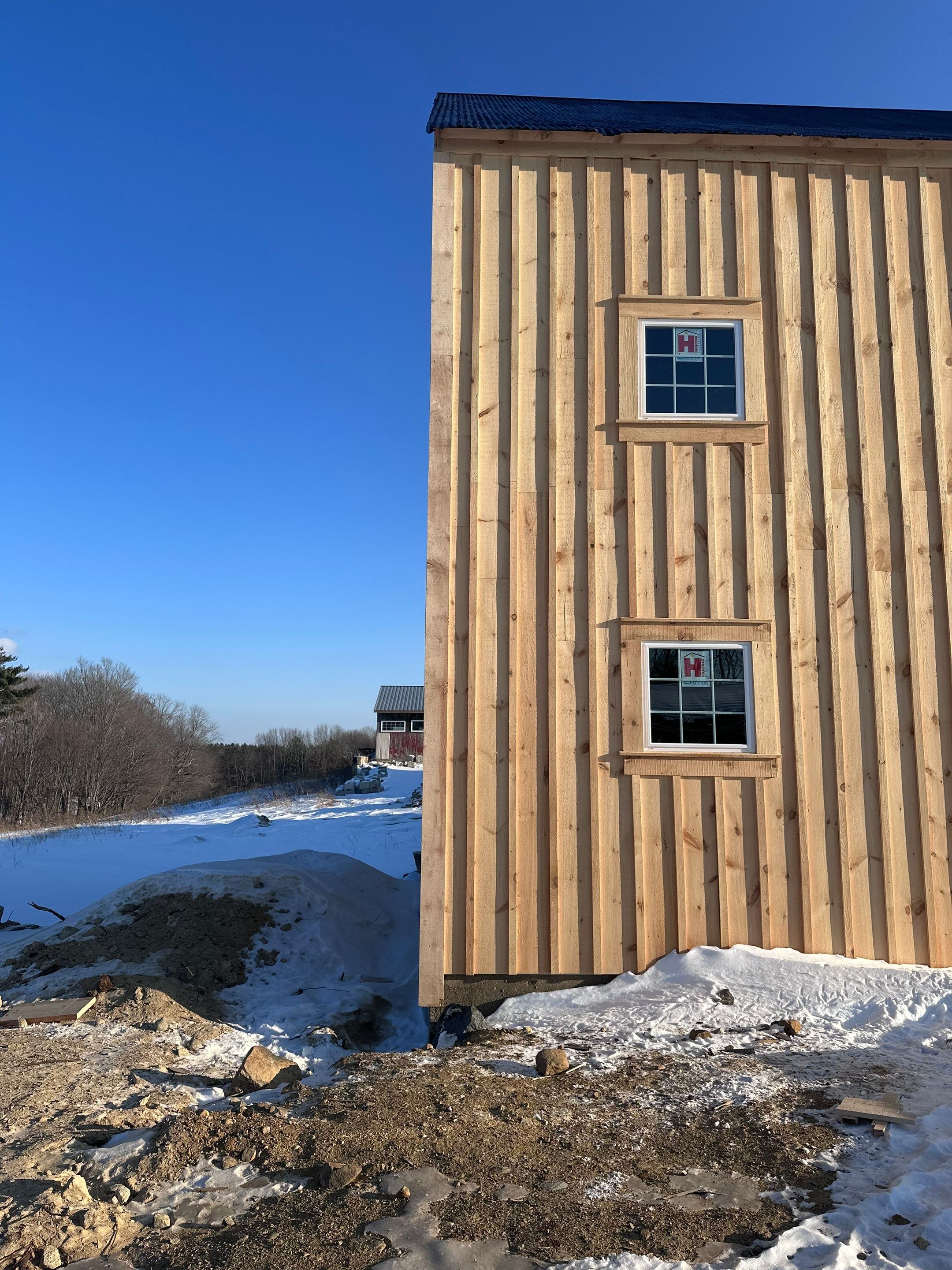 Barn Restoration and Board-and-Batten Siding Installation in Hansons Ridge by B's Roofing & Construction LLC