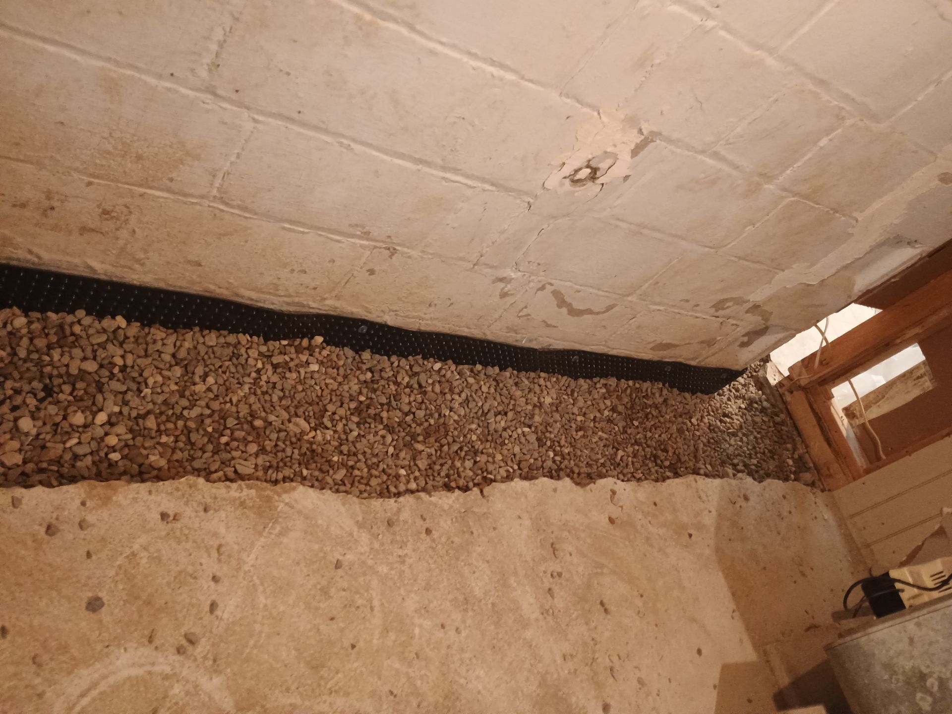 Drain Tile in Minneapolis for Kristen & Taylor by Waterproofing Northeast
