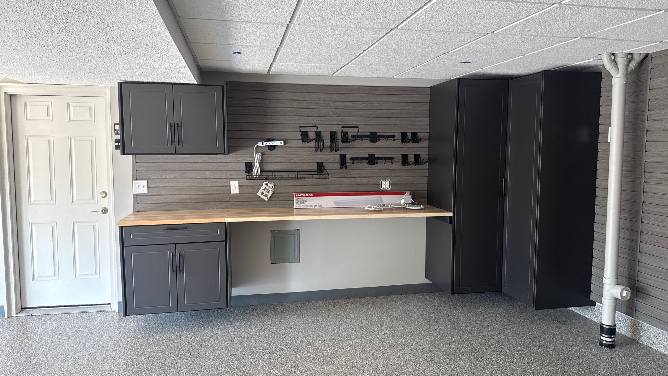 Wow Look Floor to Ceiling Slatwall  by Banner Garage