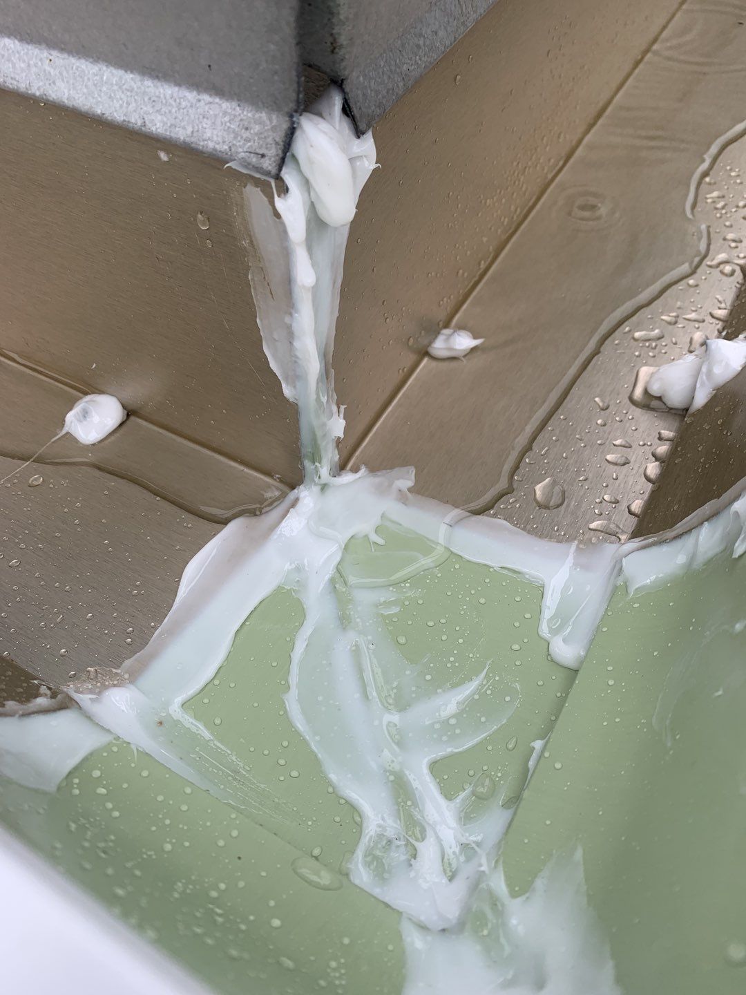 Seamless Gutter Installation Using White K-Style Gutters by Gutter Professors