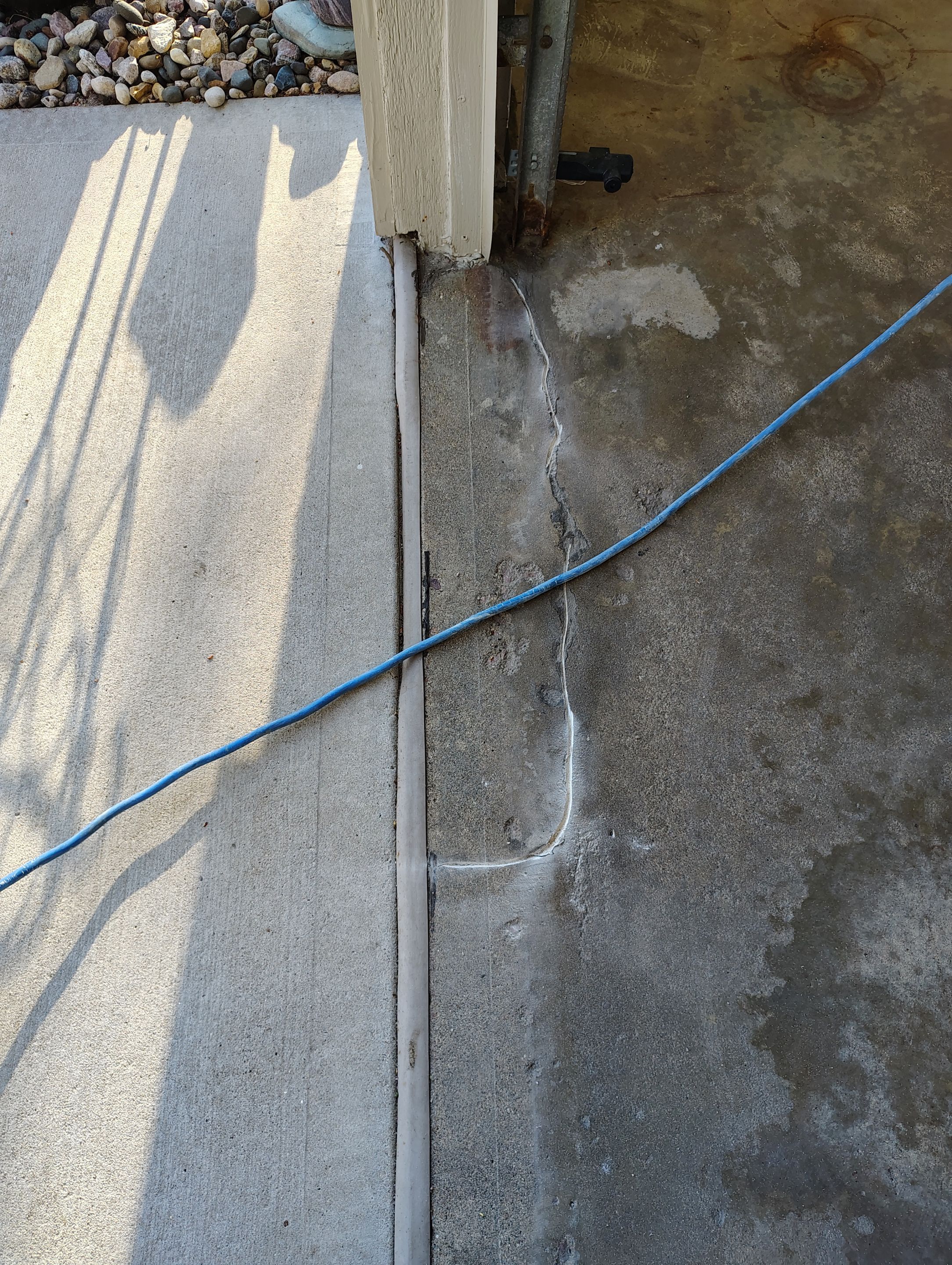 Multi-Colored Flake Epoxy Garage Floor Coating and Crack Repair by Select Painting, Coatings & Garage Cabinets