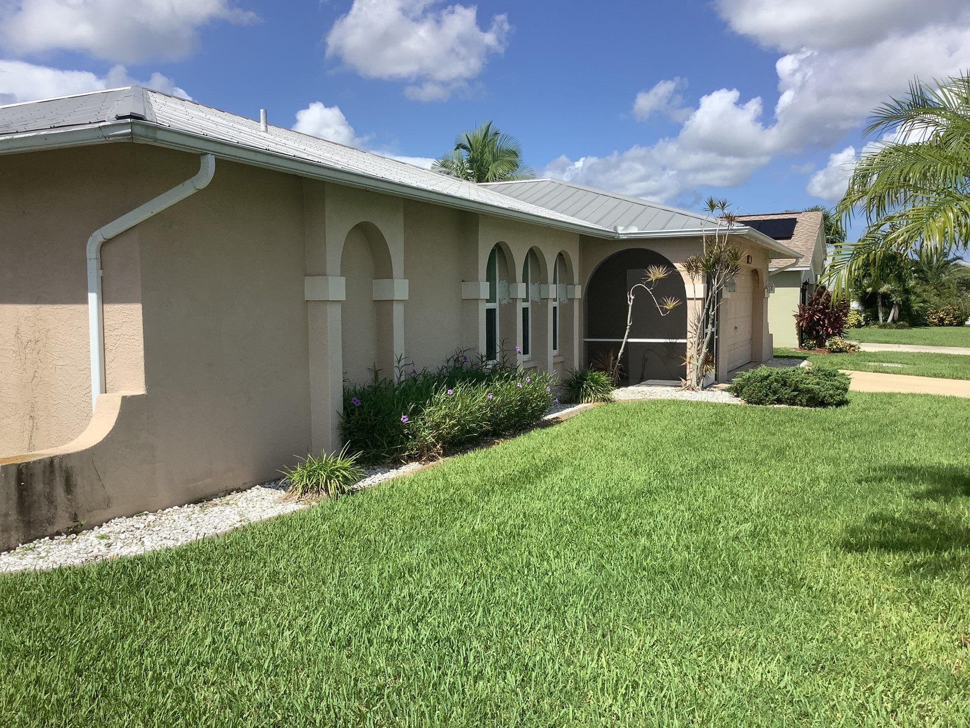 Seamless Gutters for Buildings in Cape Coral FL by Gutter Professors