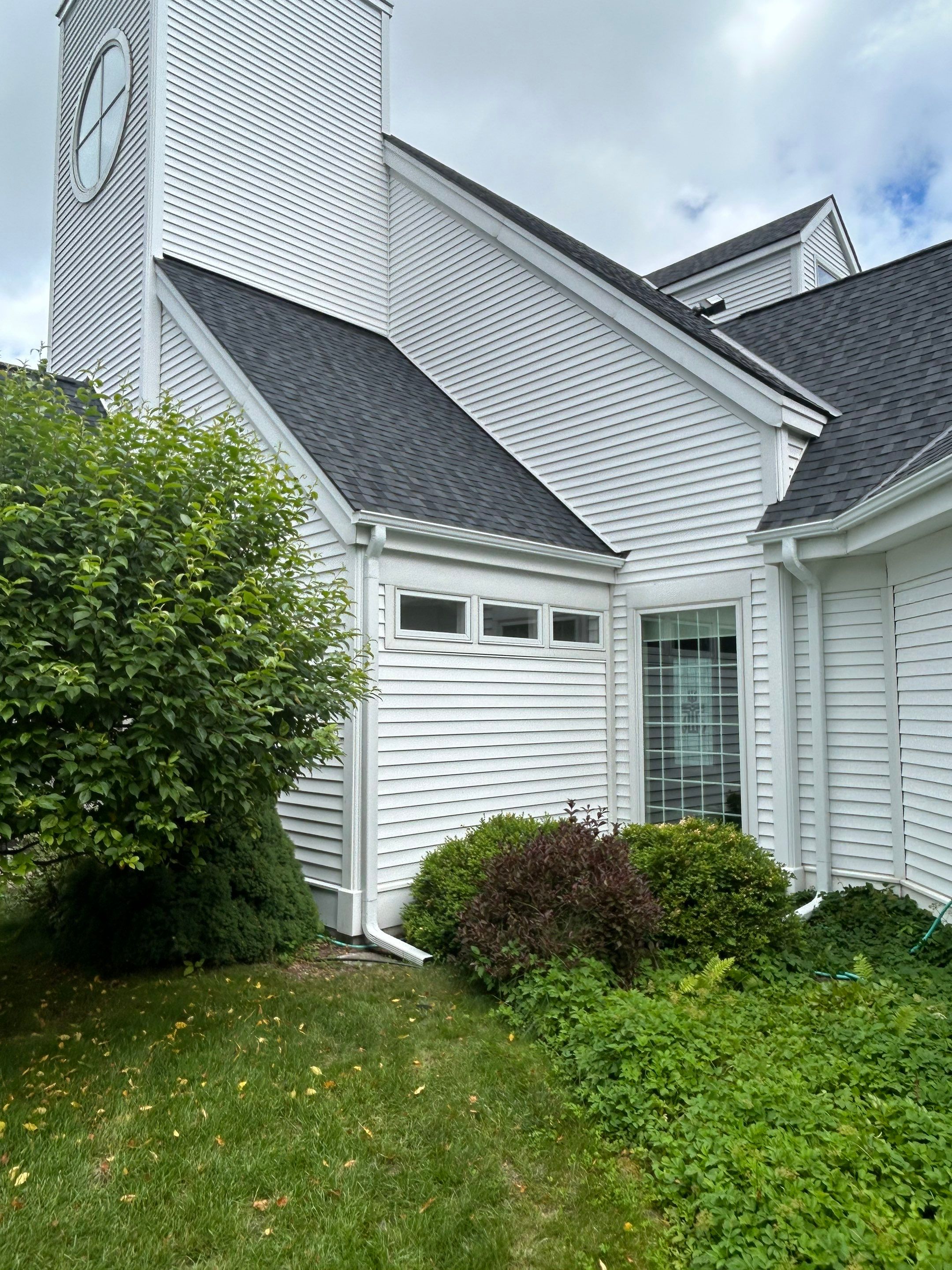 Gutter and Gutter Screen Installation for Harbor Springs Church by Rainbow Seamless Systems