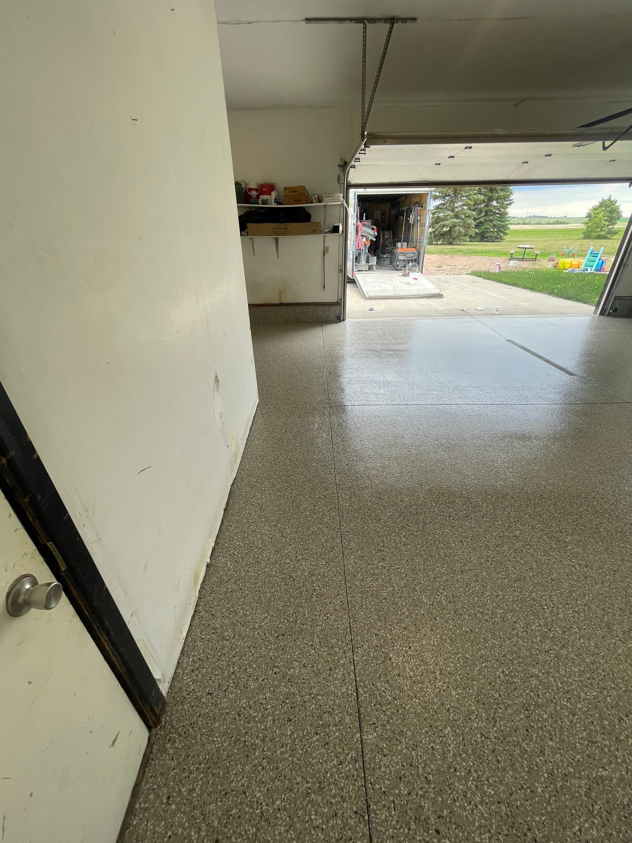 Hartford Residential Garage Floor Transformation With Decorative Chip Coating by Select Painting, Coatings & Garage Cabinets