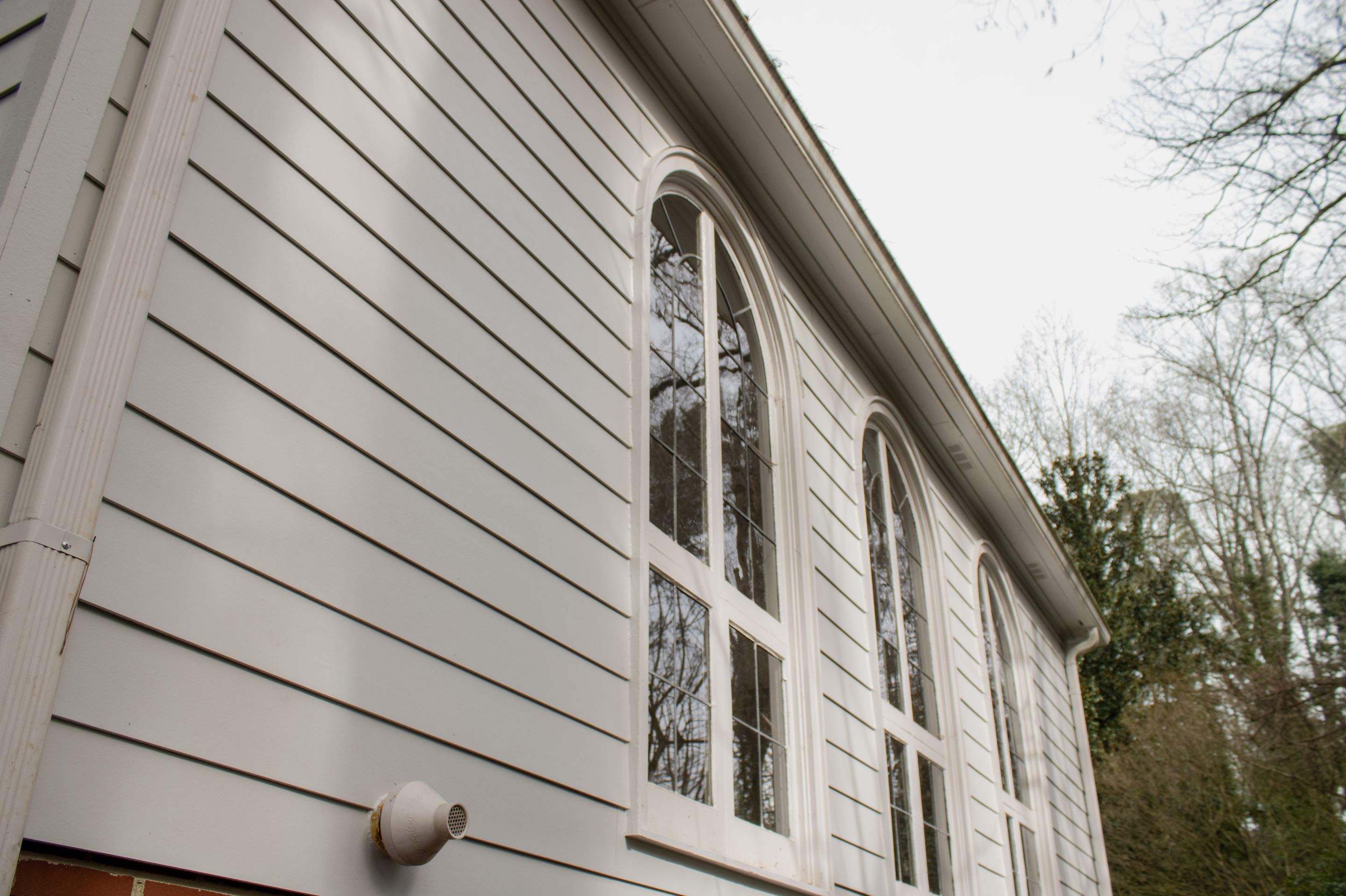 Siding Installation using James Hardie Color Plus Lap Siding by Nelson Exteriors 