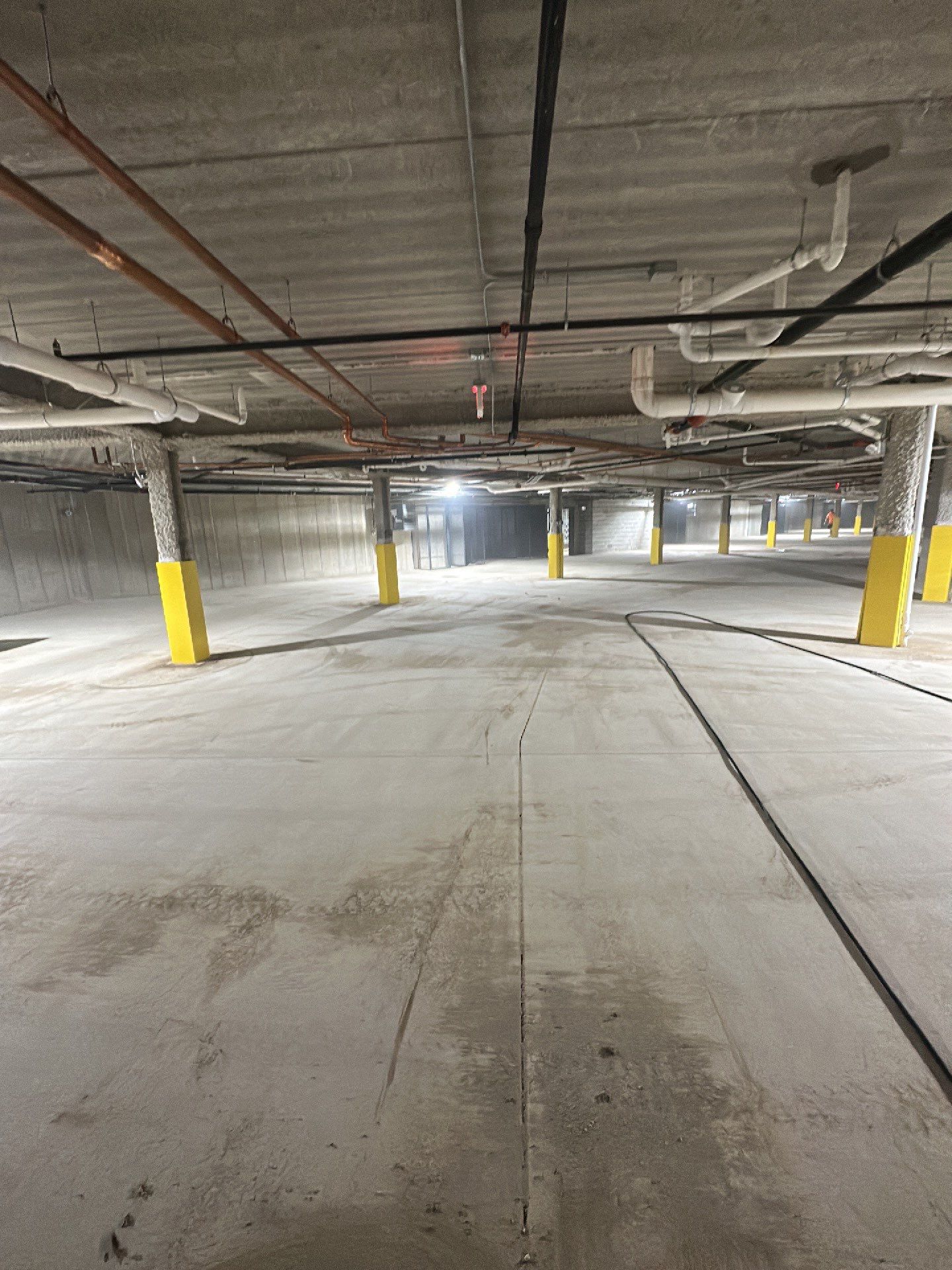 Parking garage post construction cleanup by Northern Power Washing LLC.