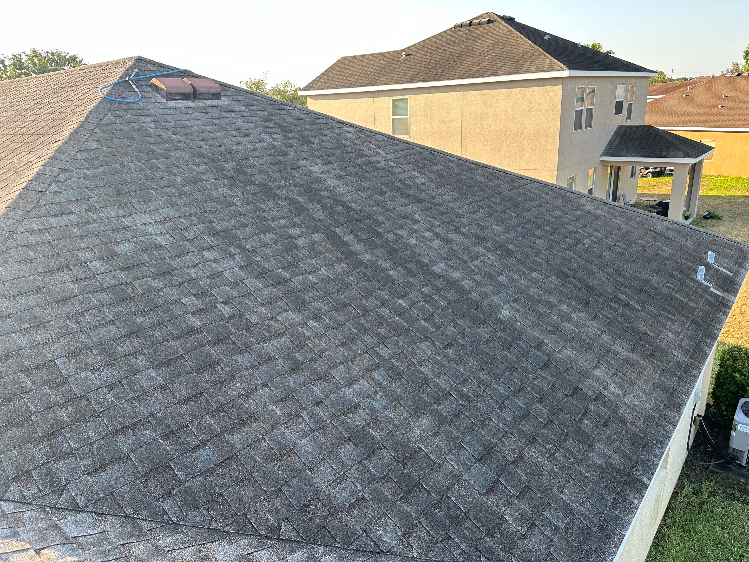 Asphalt Shingle Roof Soft Wash Cleaning & Concrete Pressure Washing in CopperStone Community, Parrish, FL by Sunshine AquaWash