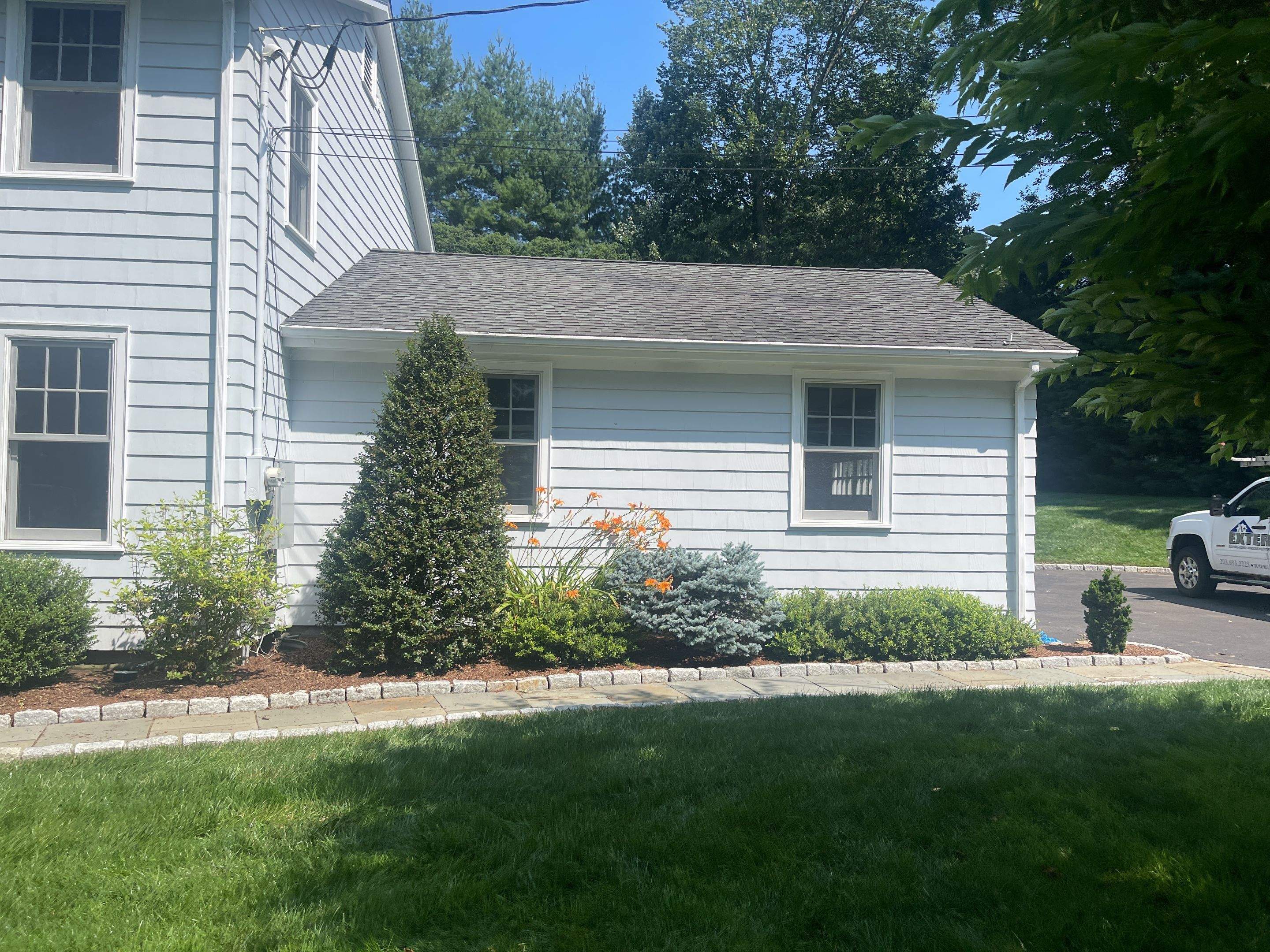 Gutter Installation using White gutters and roof clean up by A Plus Exterior
