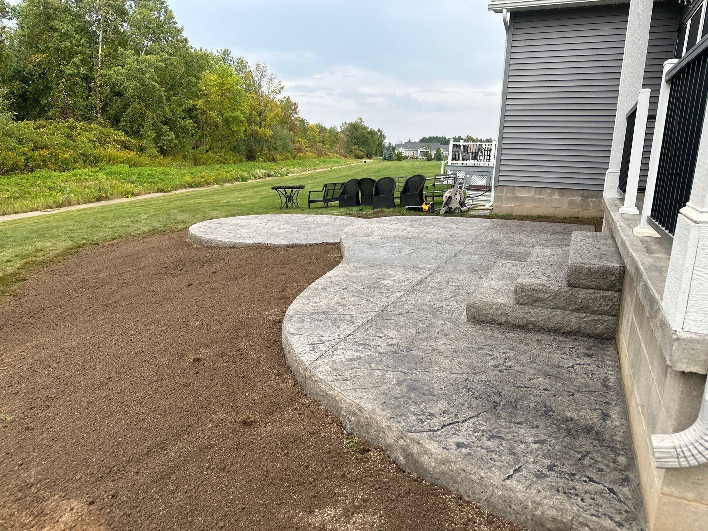Heavystone Textured Stamped Patio  by NG Masonry & Construction LLC