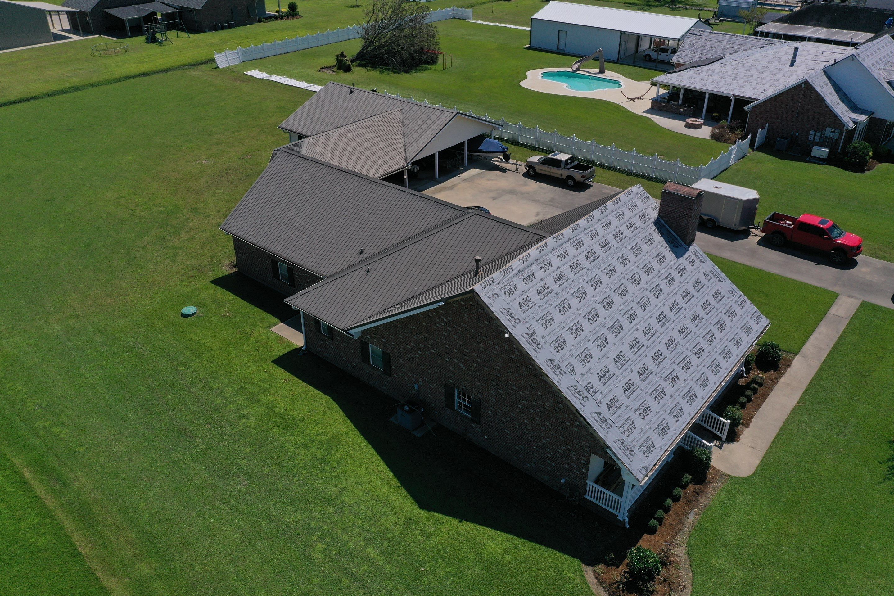 Standing Seam Metal Roof Installation by Top Team Roofing & Construction