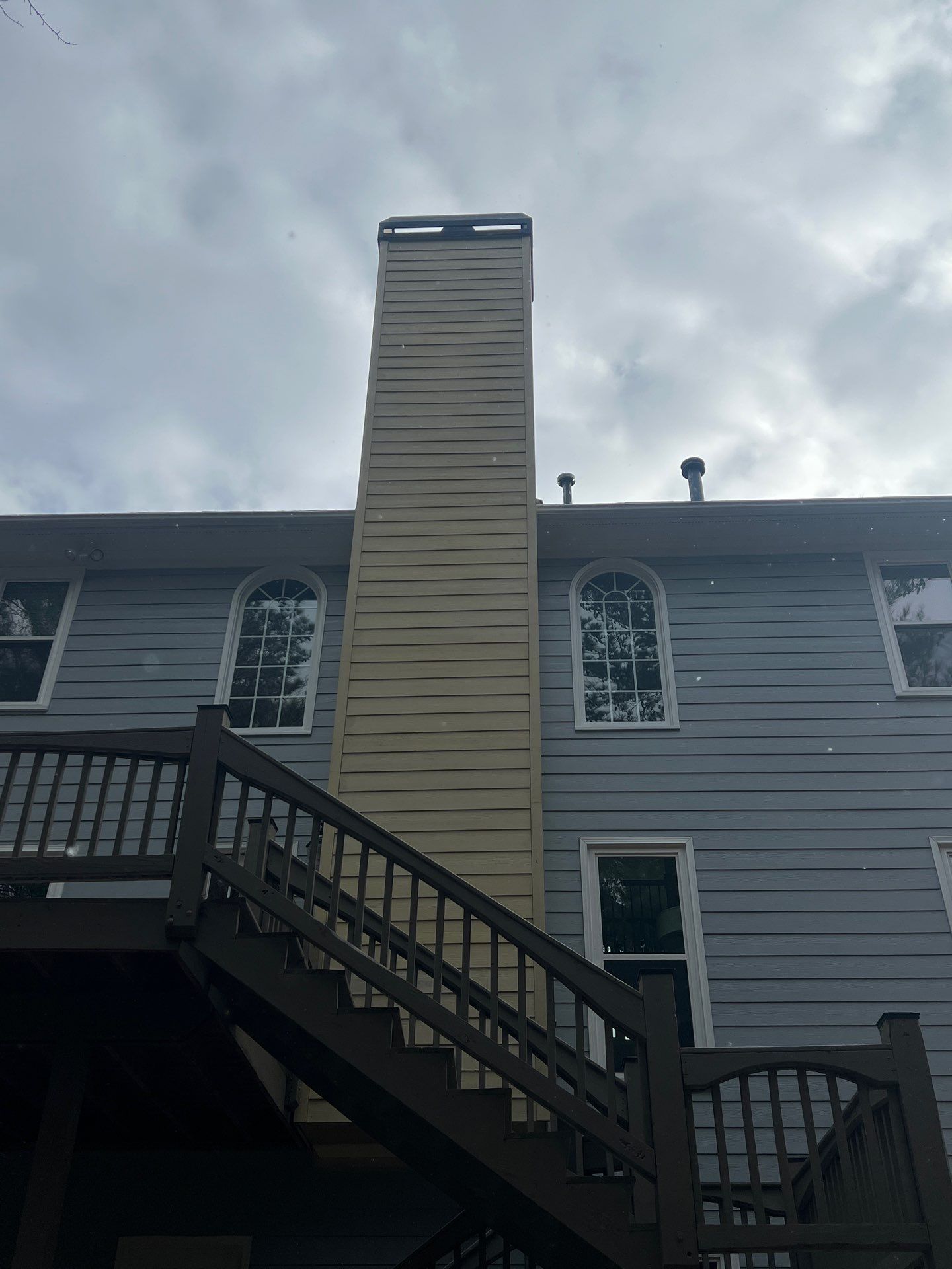 Chimney Siding Reconstruction and Full Exterior Painting in Marietta by Swift Home Renovations