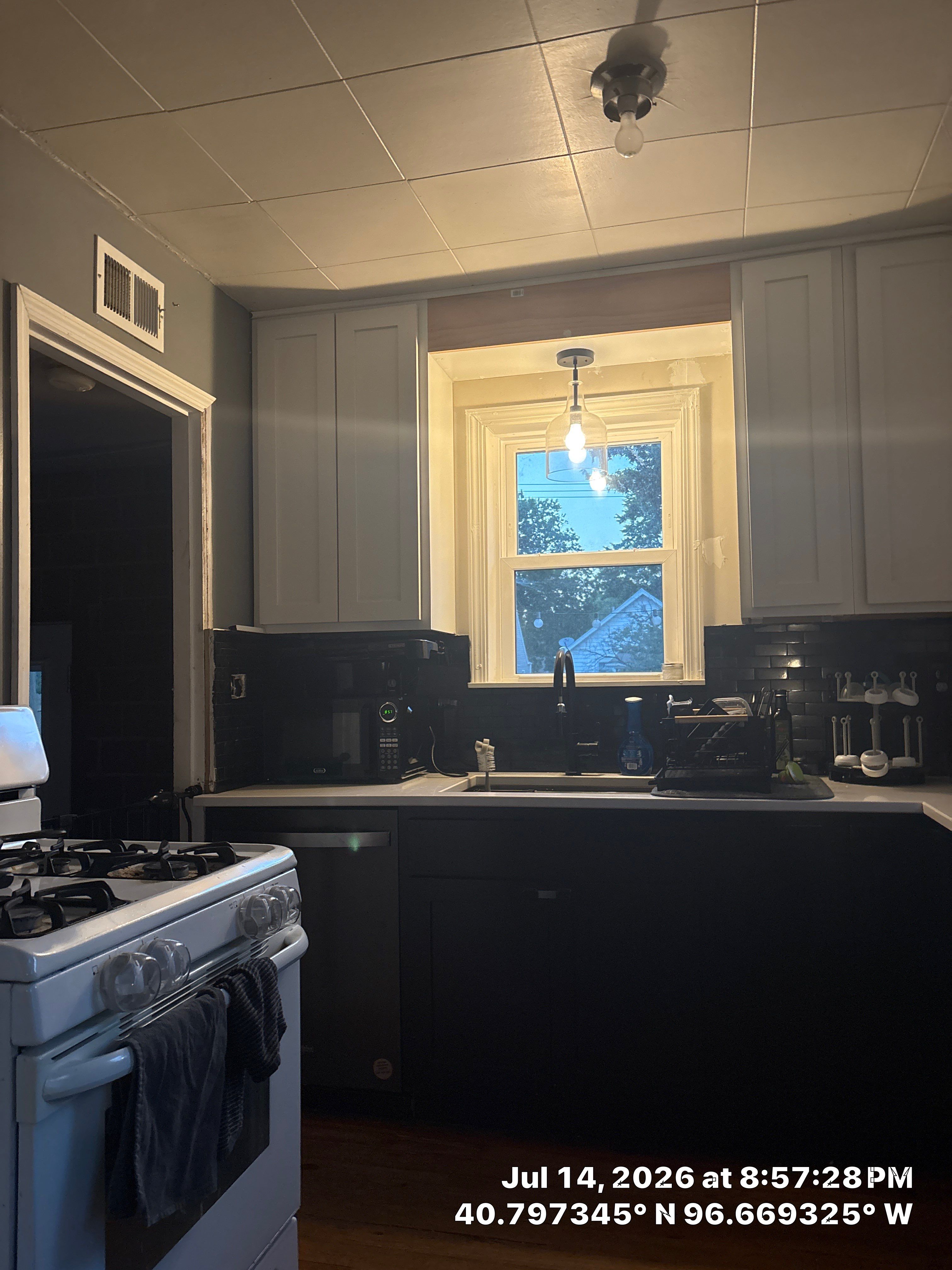Two-Tone Kitchen Remodel with Quartz Countertops in Lincoln by CompanyCam Sales Demo