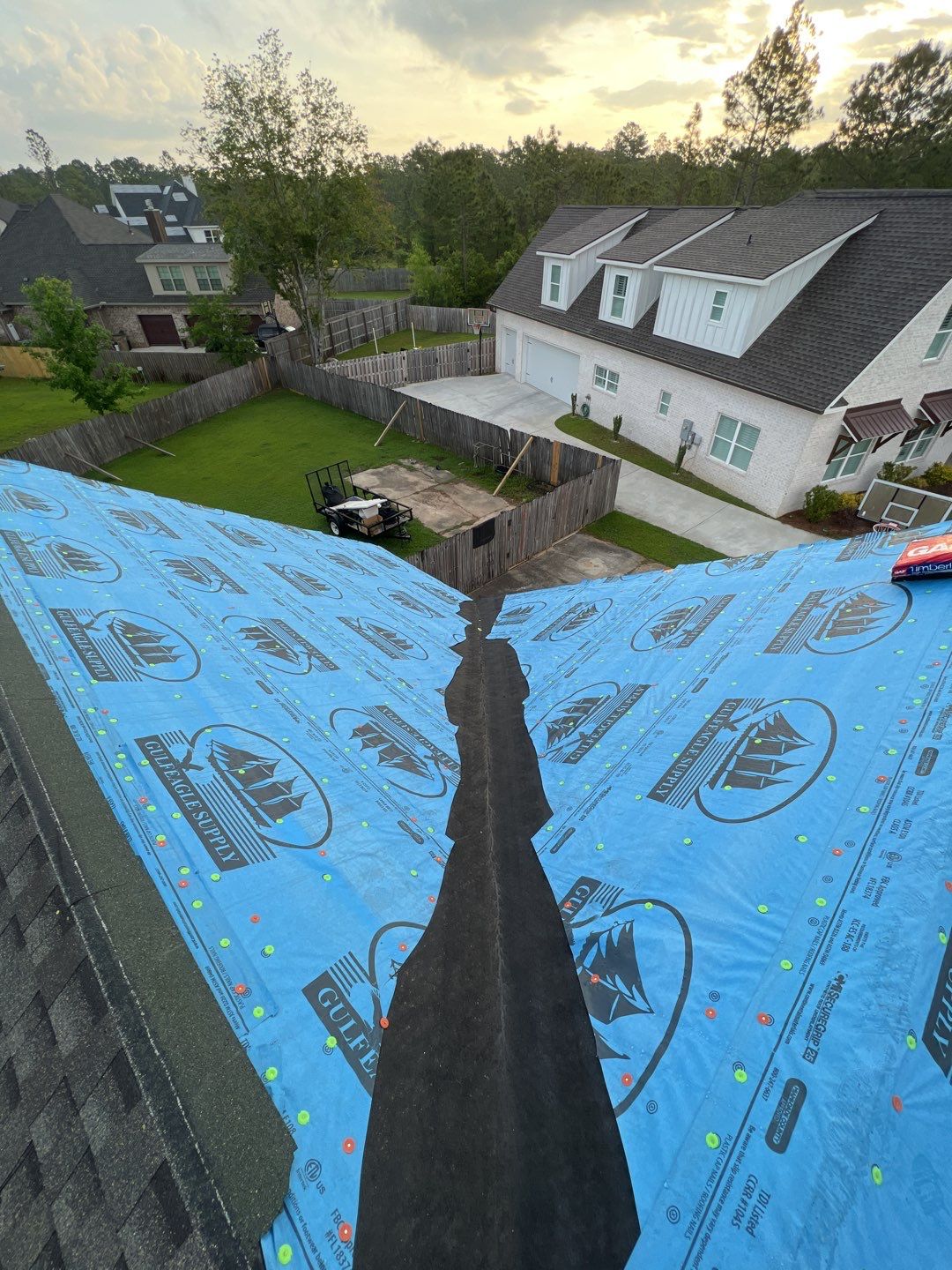 Residential Roofing Installation using Roof Replacement by American Roofing & Construction LLC