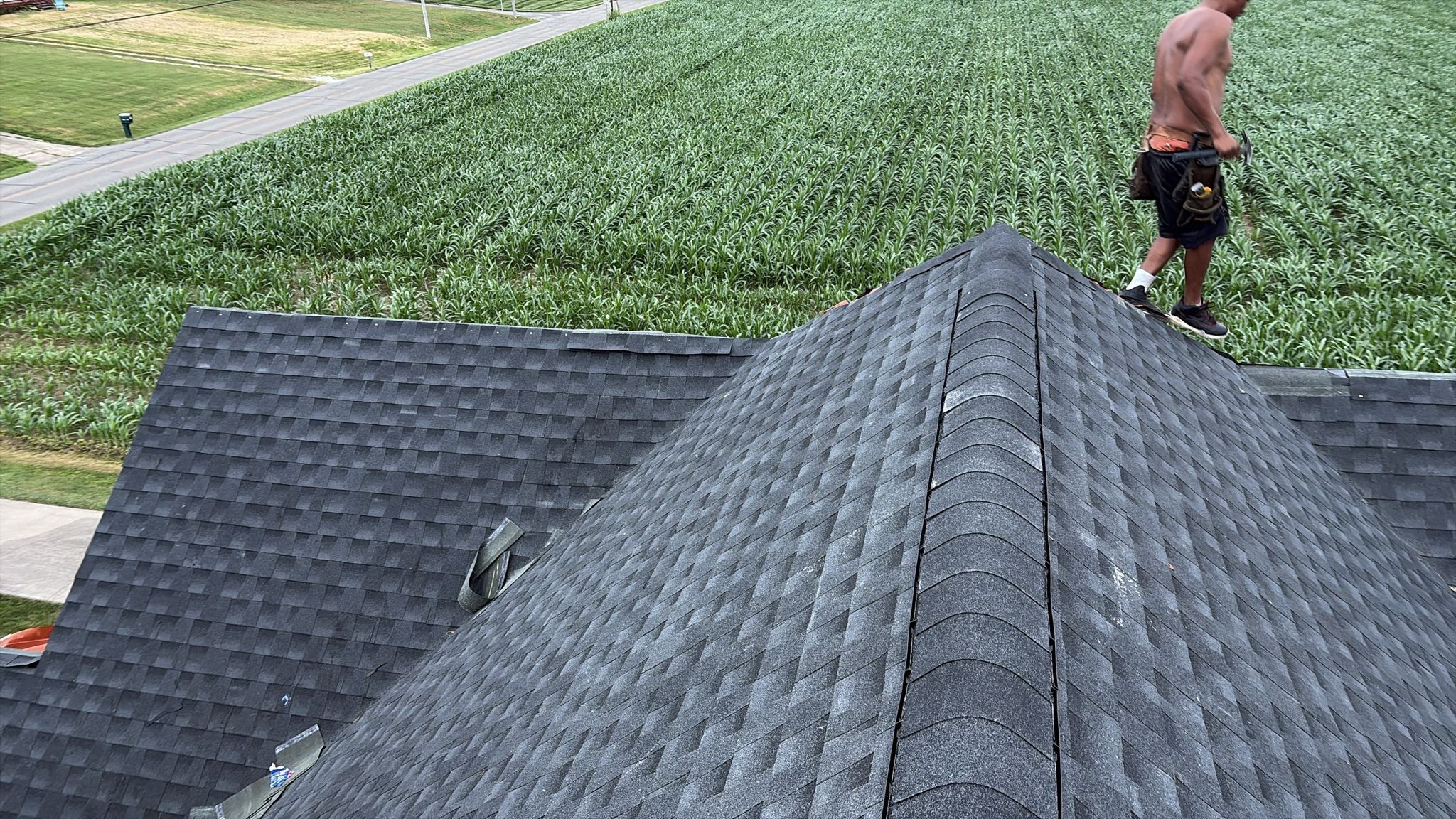 Residential Roofing Installation using GAF Timberline HDZ Charcoal by Rainstoppers Roofing