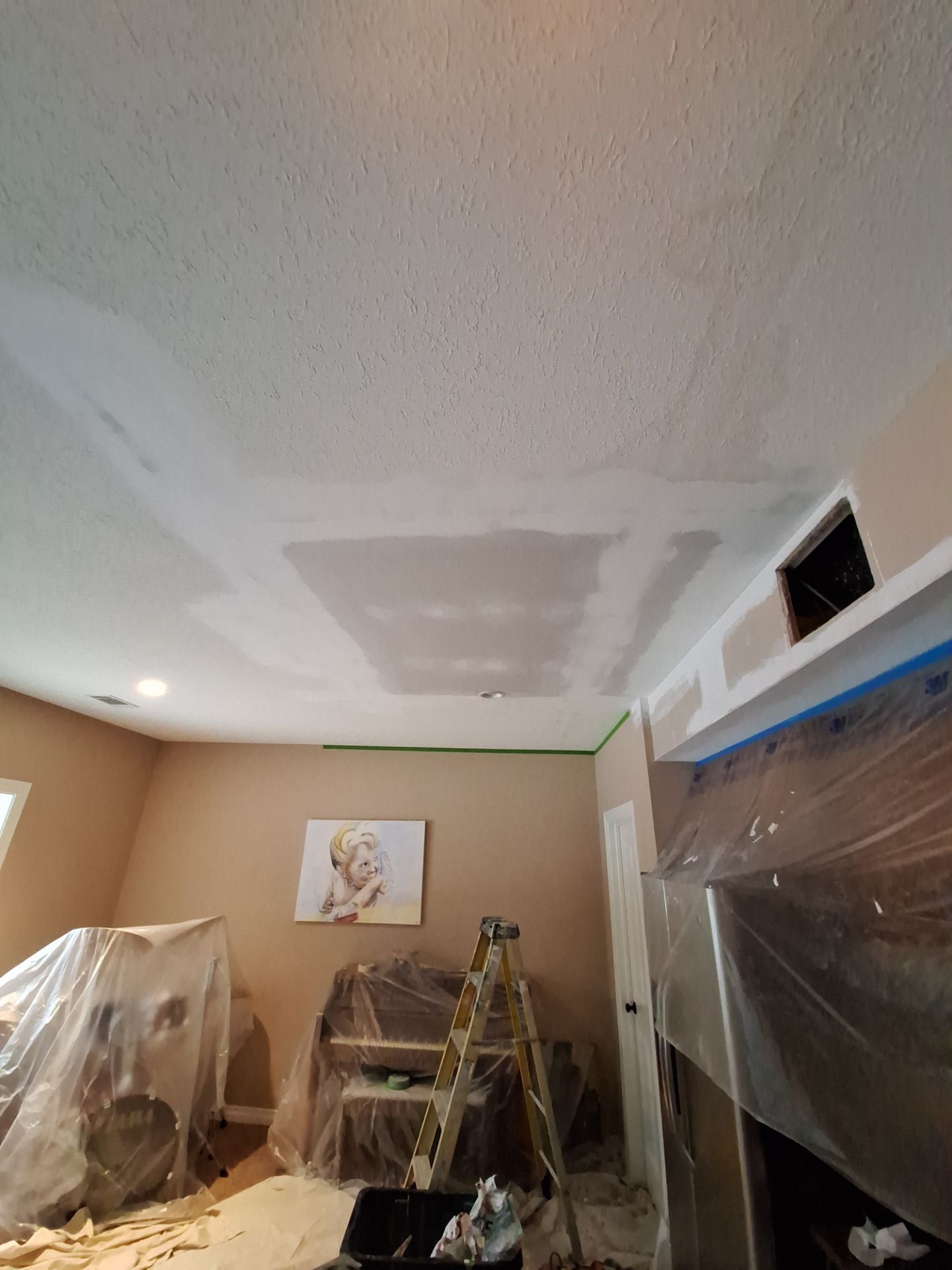 Basement Ceiling & Wall Repair + Interior Painting in Grand Haven, Michigan by Gordon Painting