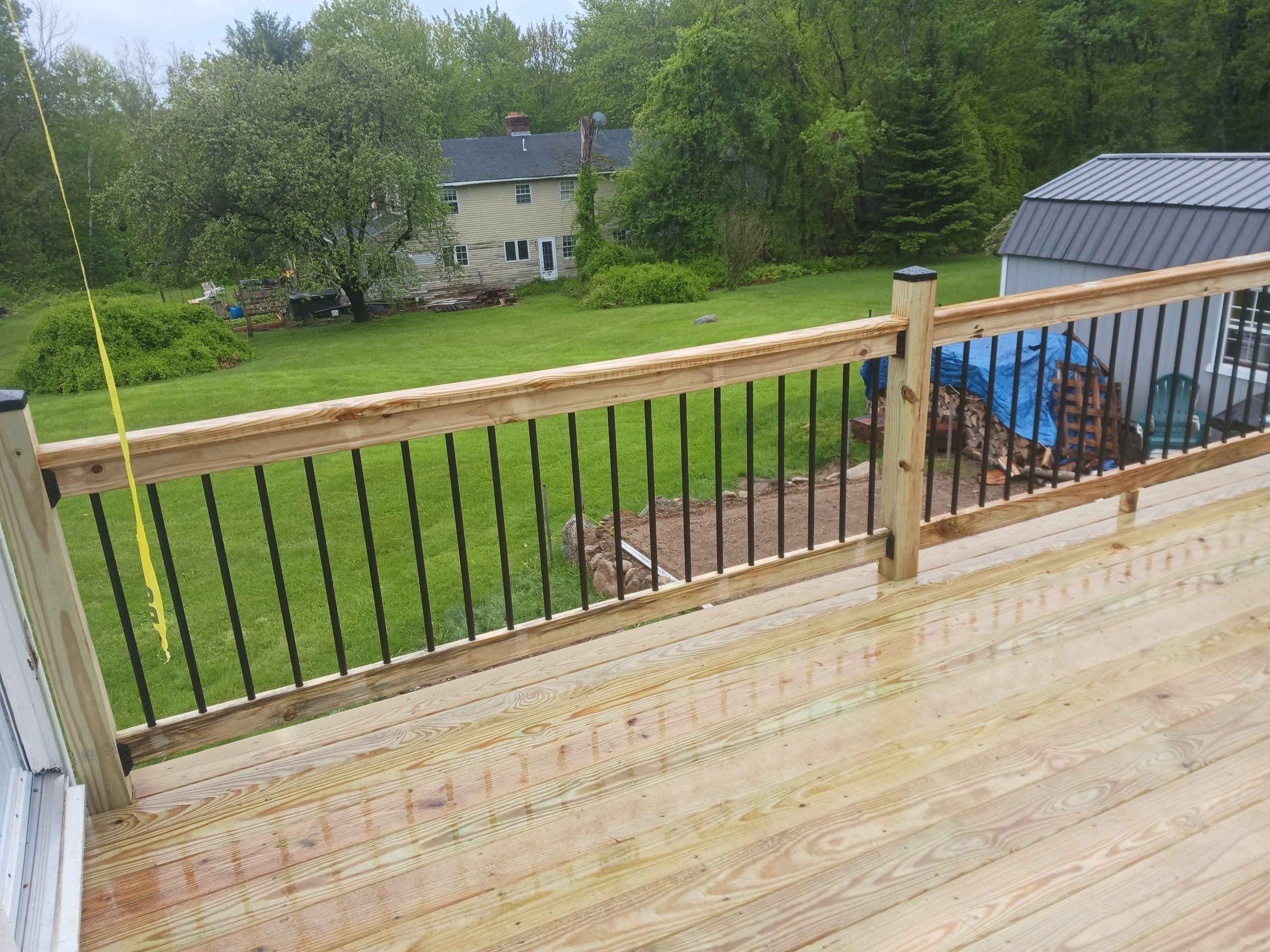 Moultonborough, NH – Pressure-Treated Deck Installation by Tall pine roofing