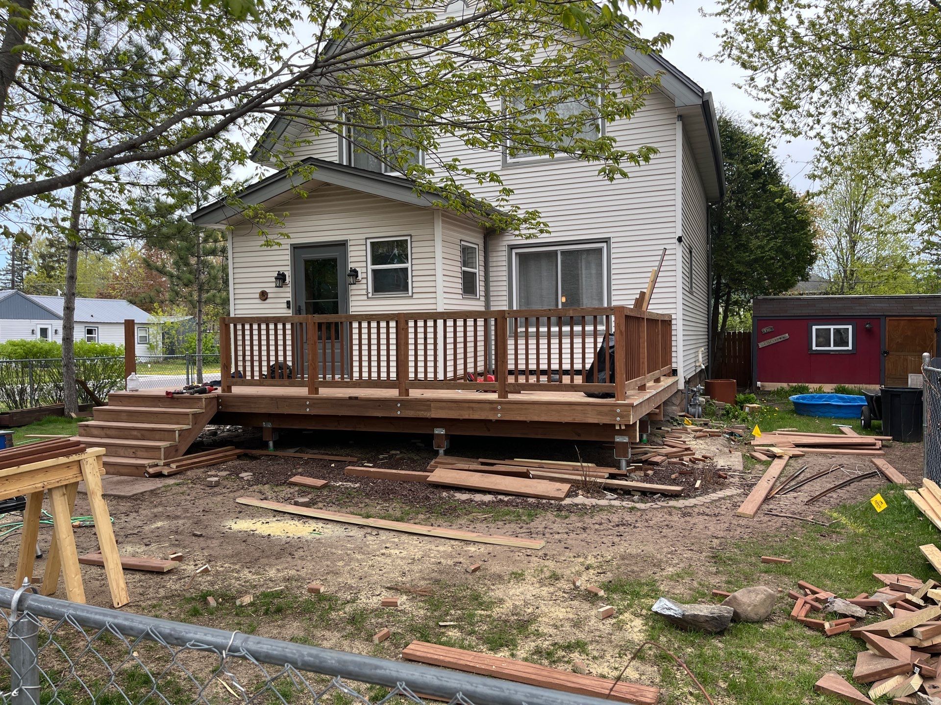 Brown Treated Deck by Anchor North Property Services