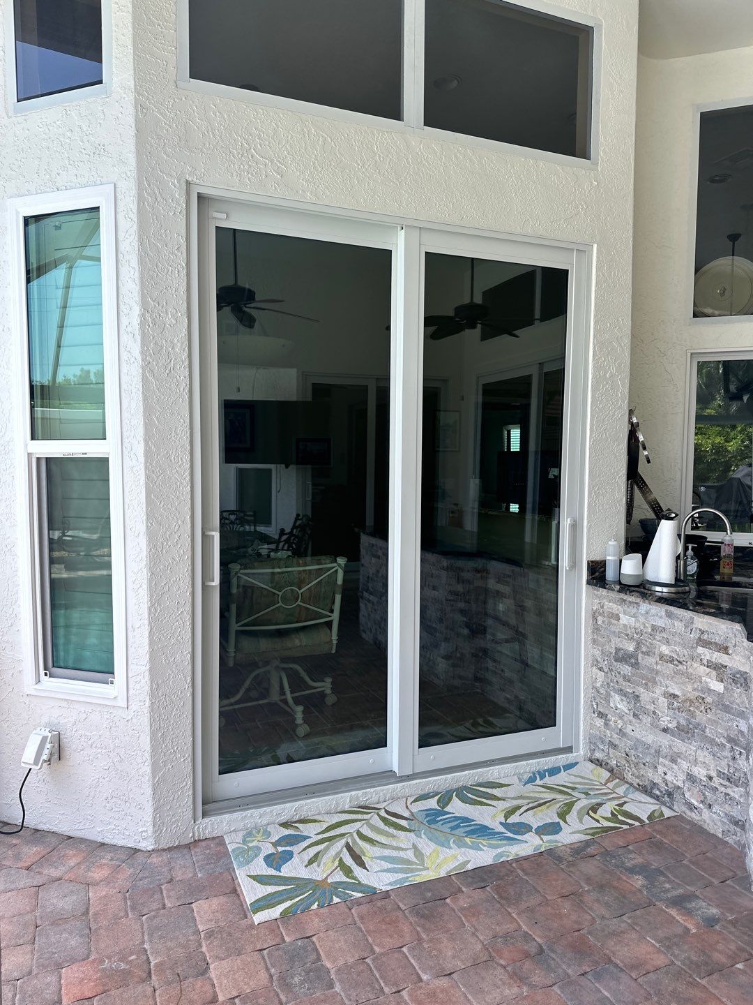 Window Installation using PGT Aluminum for the doors and PGT Vinyl for the Windows  by Windows For Life 