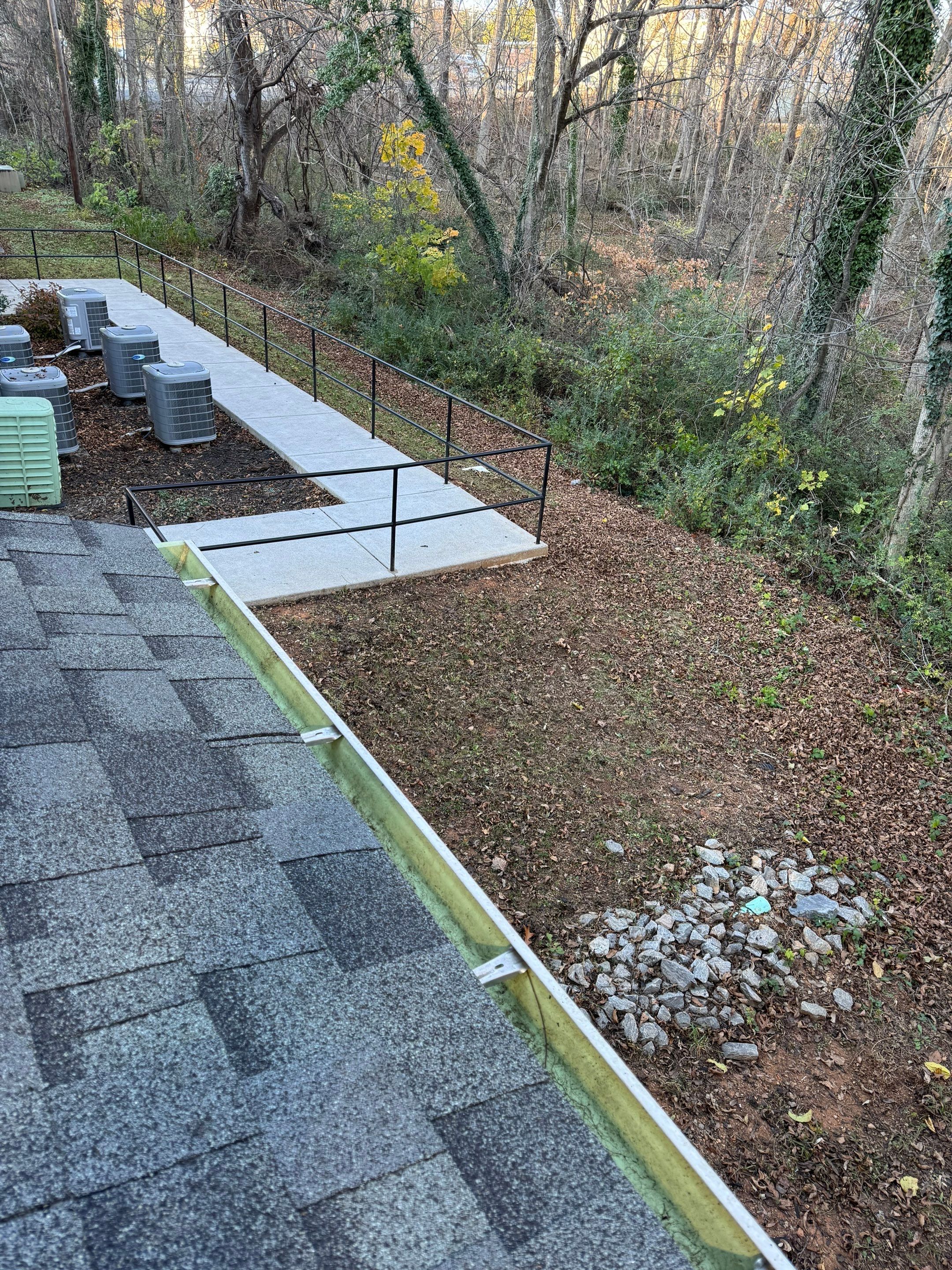 Commercial gutter cleaning Roanoke, VA before photo with filled gutters