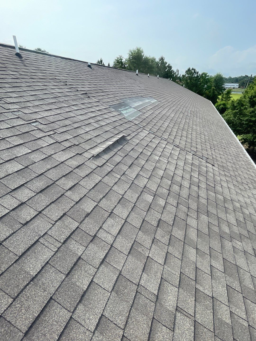 Residential Roofing Installation using Roof Replacement by American Roofing & Construction LLC