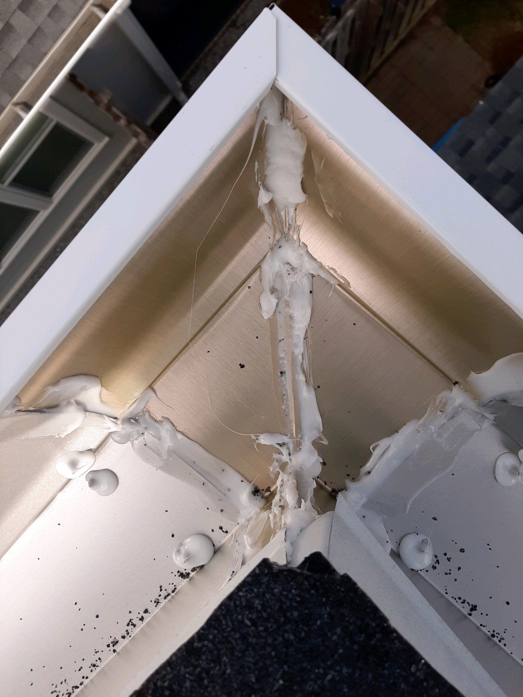 Gutter Installation Using White K-Style 6 Inch Seamless Gutters by Gutter Professors
